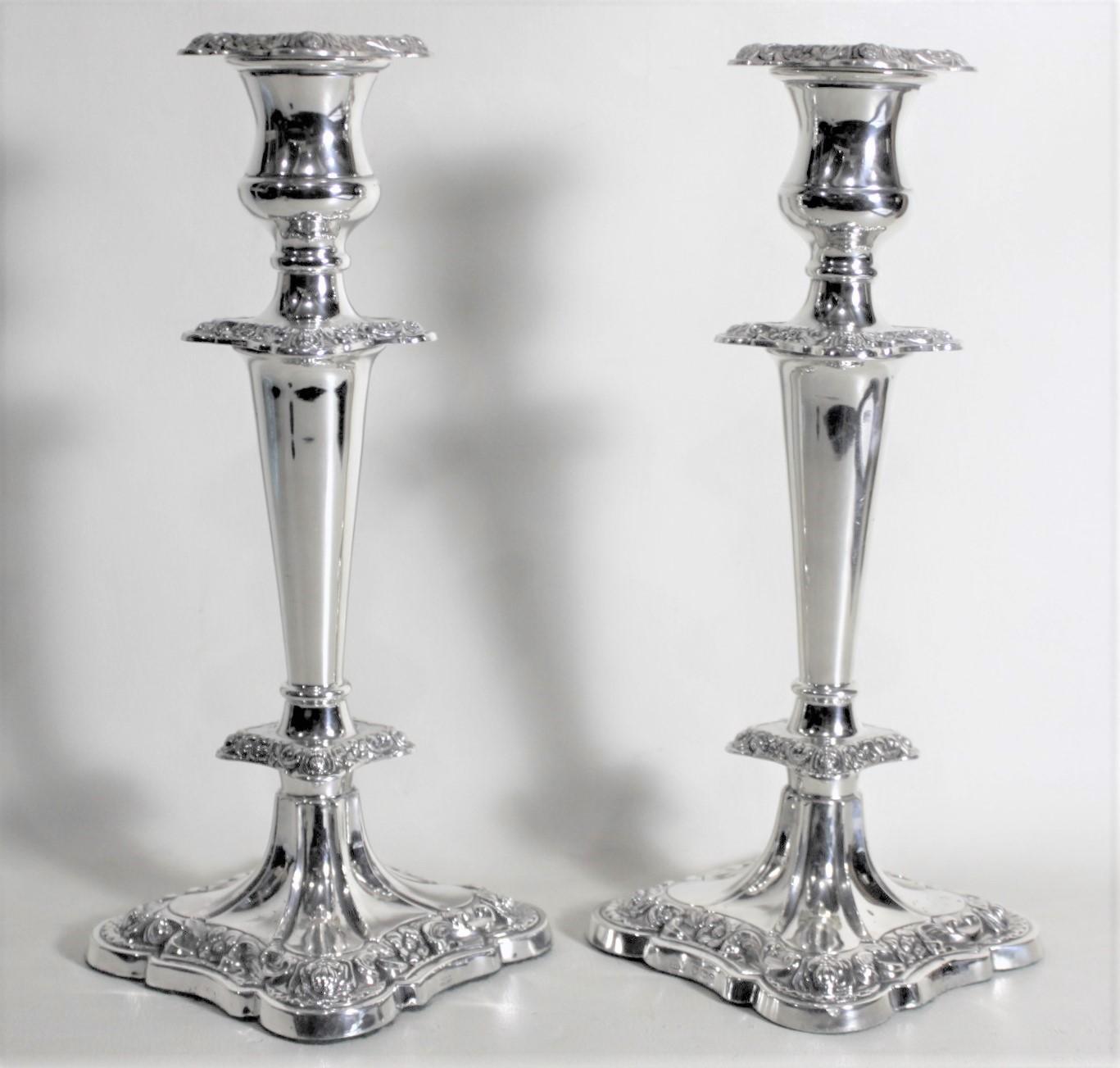 20th Century Pair of English Sterling Silver Candlesticks with Chased Floral Decoration