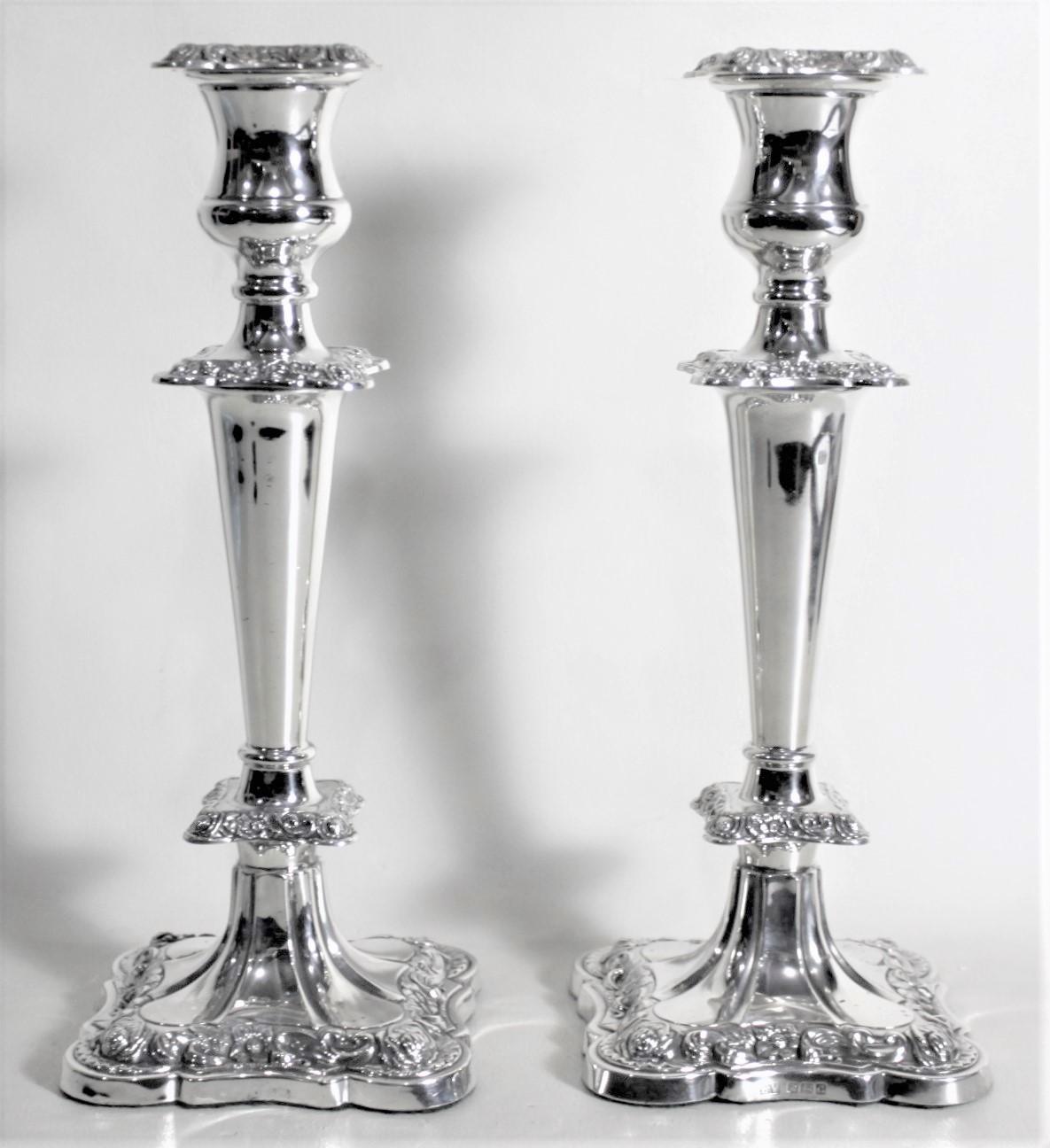 Pair of English Sterling Silver Candlesticks with Chased Floral Decoration 1