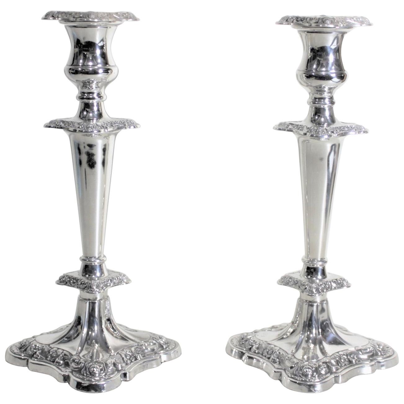 Pair of English Sterling Silver Candlesticks with Chased Floral Decoration