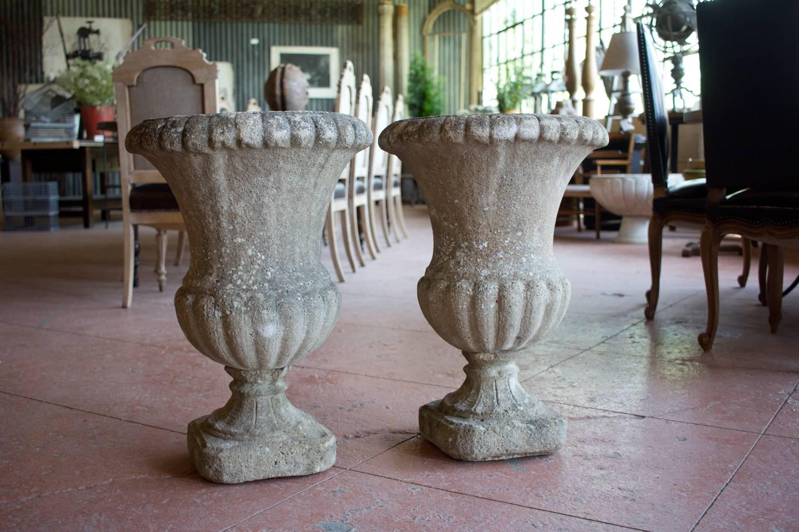 Pair of substantial antique stone urns.