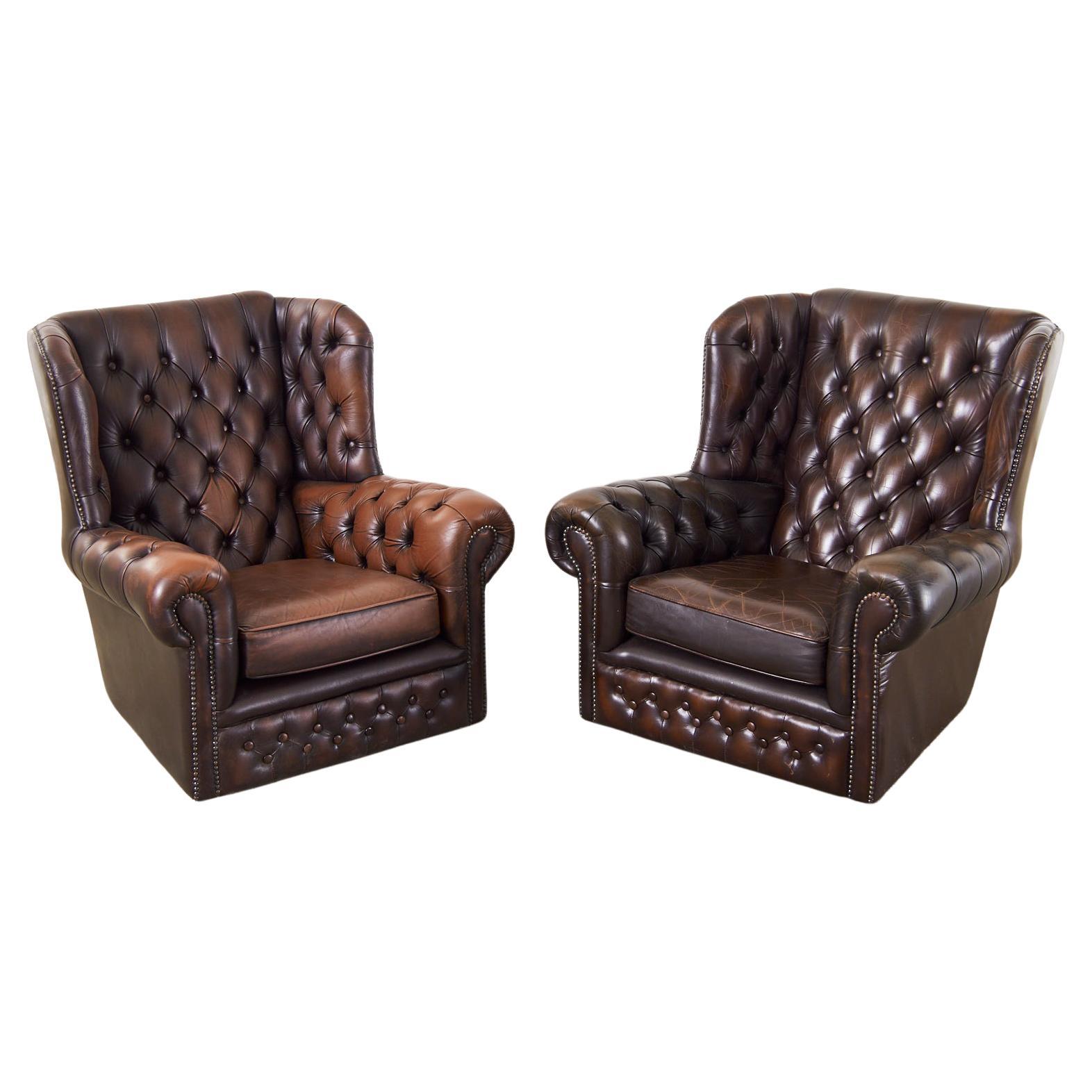 Pair of English Thomas Lloyd Cigar Leather Chesterfield Wingback Chairs