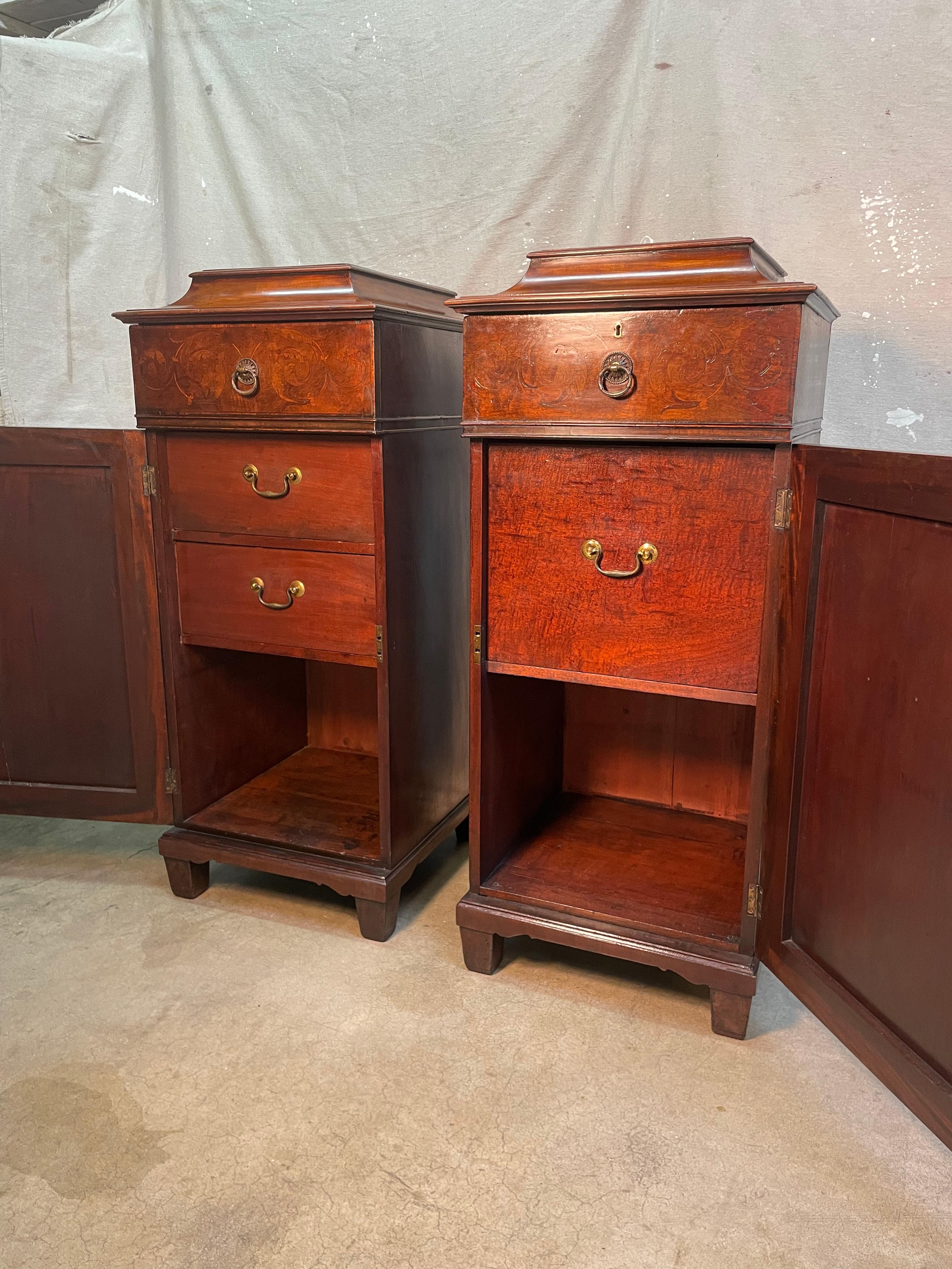 Antique pair of Cellarettes or Liquor Cabinets from England, that were generally custom made wooden chests for storing a small number of alcohol bottles, and the finest silverware. Made from one of the more dependable, strong woods of mahogany. Has
