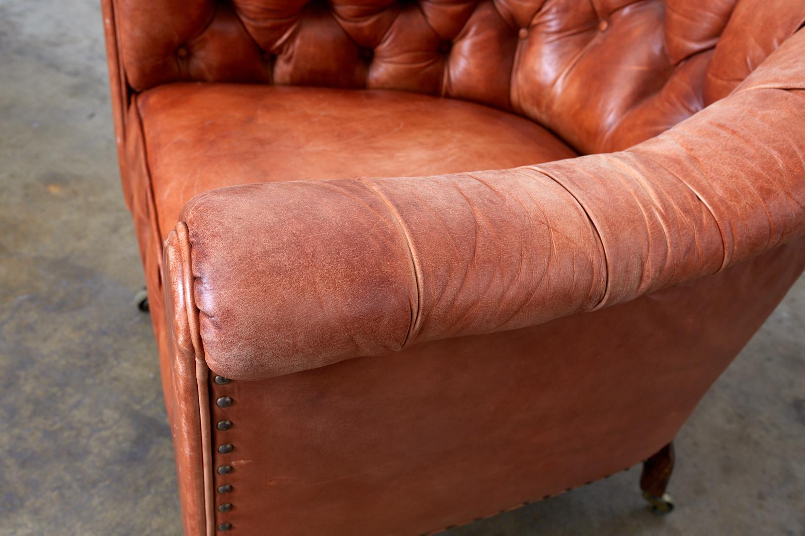 Mahogany Pair of English Tufted Leather Chesterfield Club Chairs