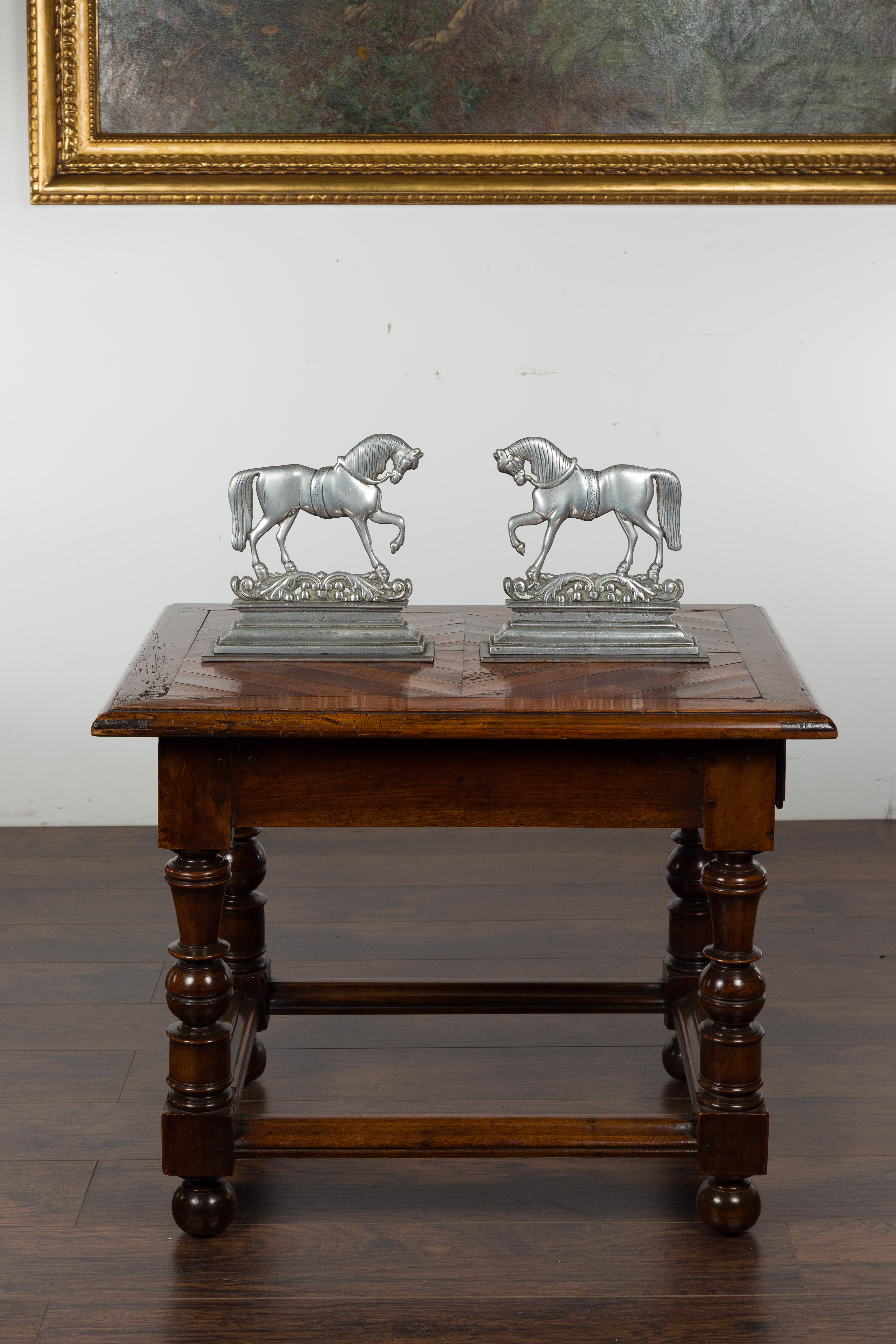 Pair of English Turn of the Century Metal Bookends Depicting Prancing Horses In Good Condition For Sale In Atlanta, GA