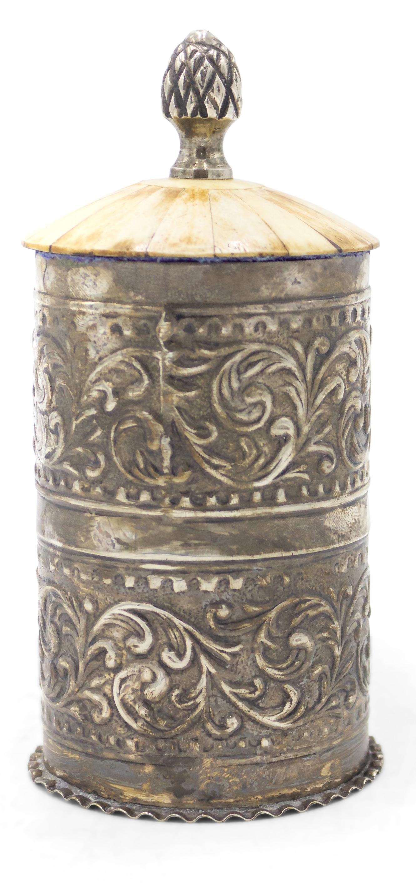 Pair of English Victorian-style (20th Century) hammered silver cylindrical shaped box with scroll design and veneered cover with acorn finial top. (stamped: Royal House) (priced as pair).
   