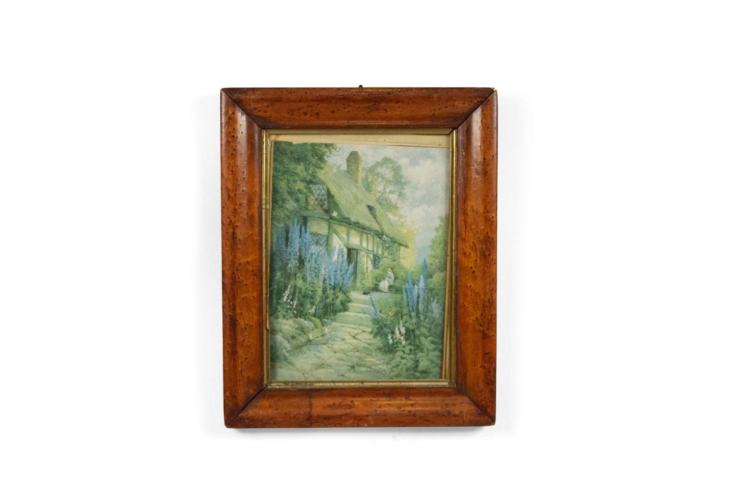 PAIRE de tirages en couleur encadrés en érable anglais représentant des maisons à toit de chaume dans un paysage vertical.