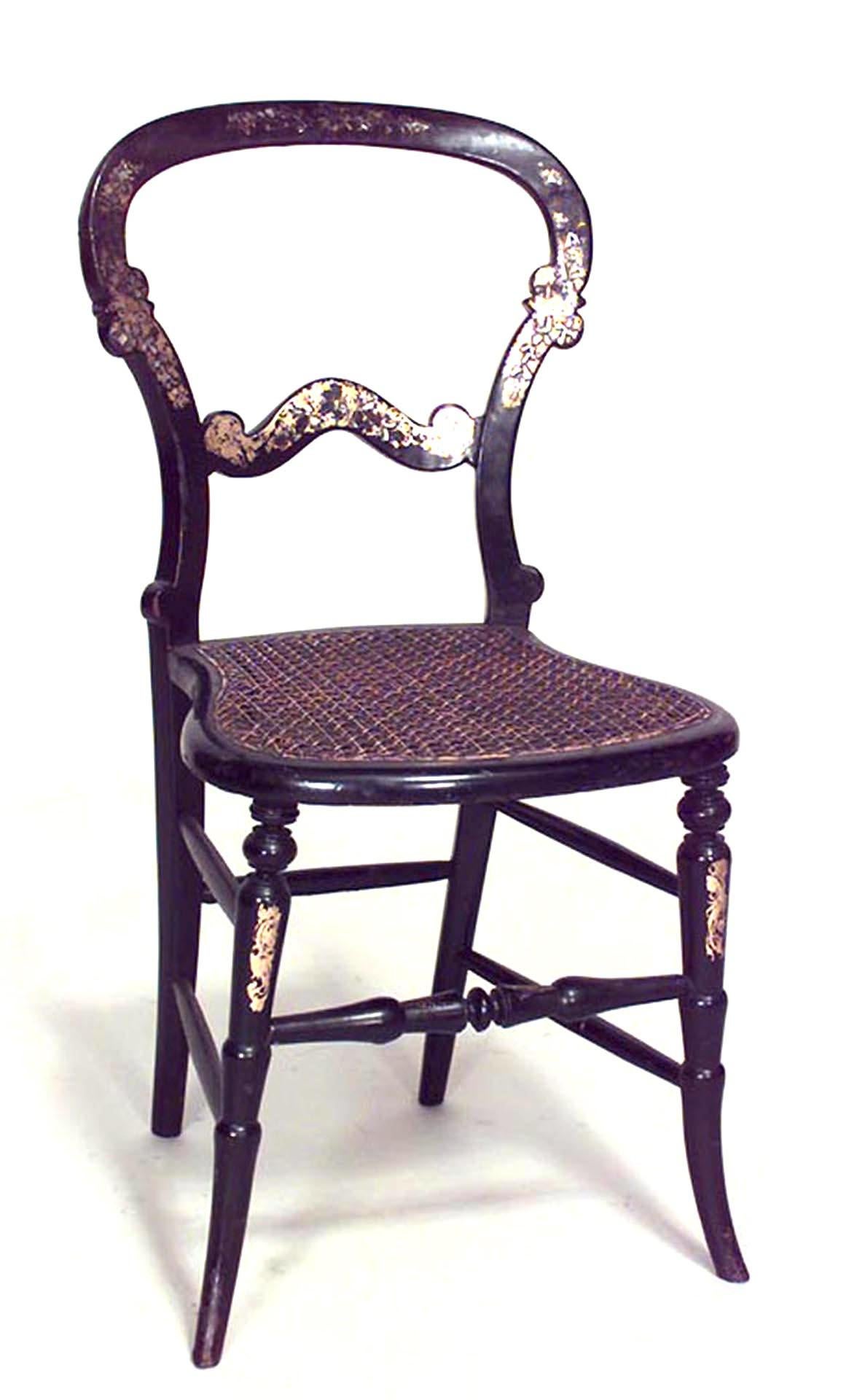 Pair of English Victorian paper mâché and pearl inlaid black lacquer side chairs with shaped open back and stretcher.
 