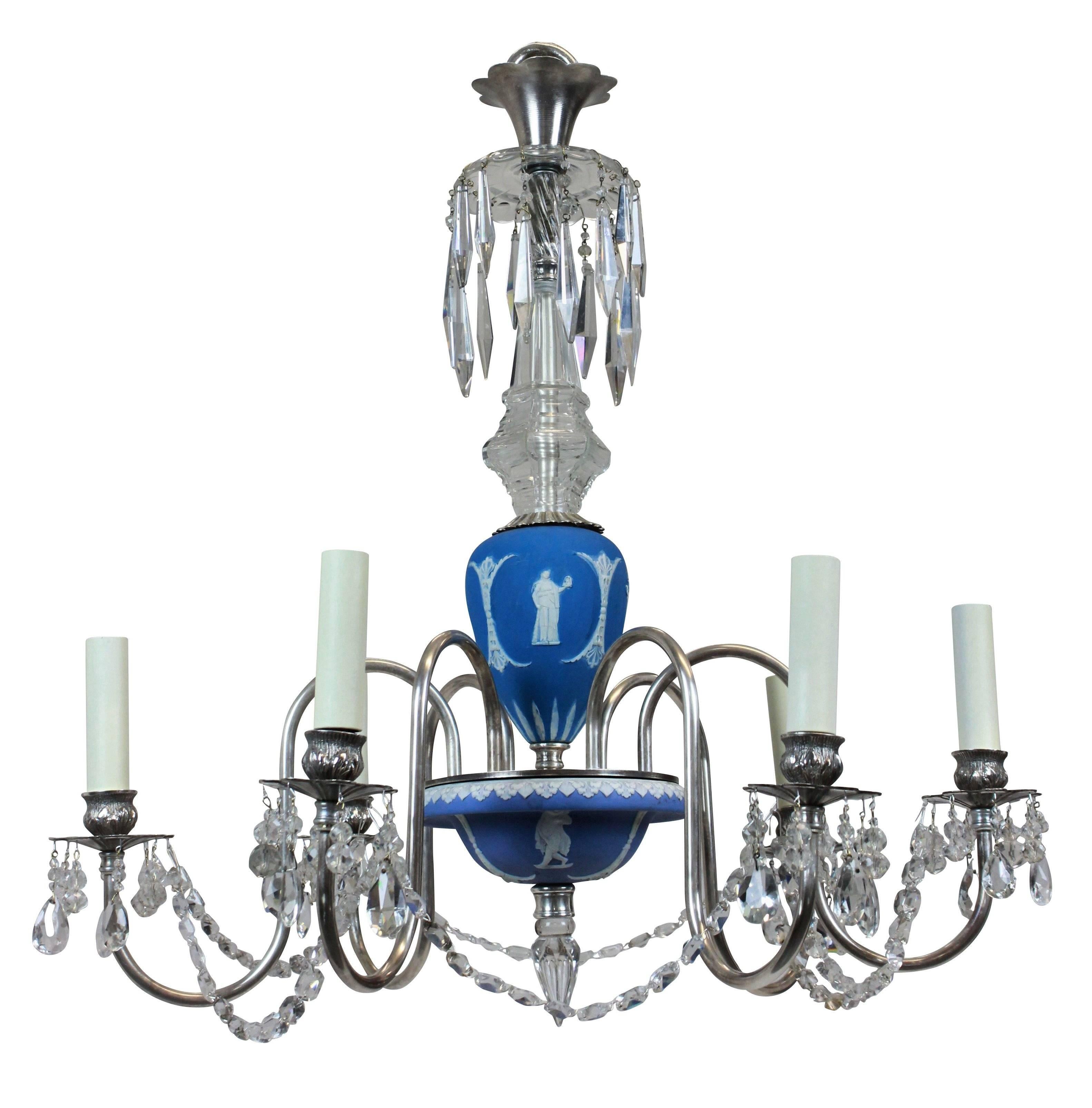 A pair of English Wedgwood chandeliers with silver and cut-glass, each of six arms.

