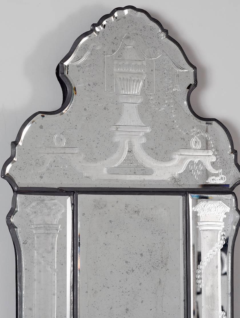 Pair of engraved bevelled edge sconces with hand bevelled back and hand engraved panels
silvered finish, double arm candleholders.
Measures: H 23