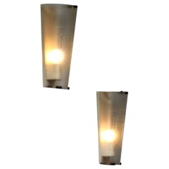 Pair of engraved glass wall lamps with antique decoration