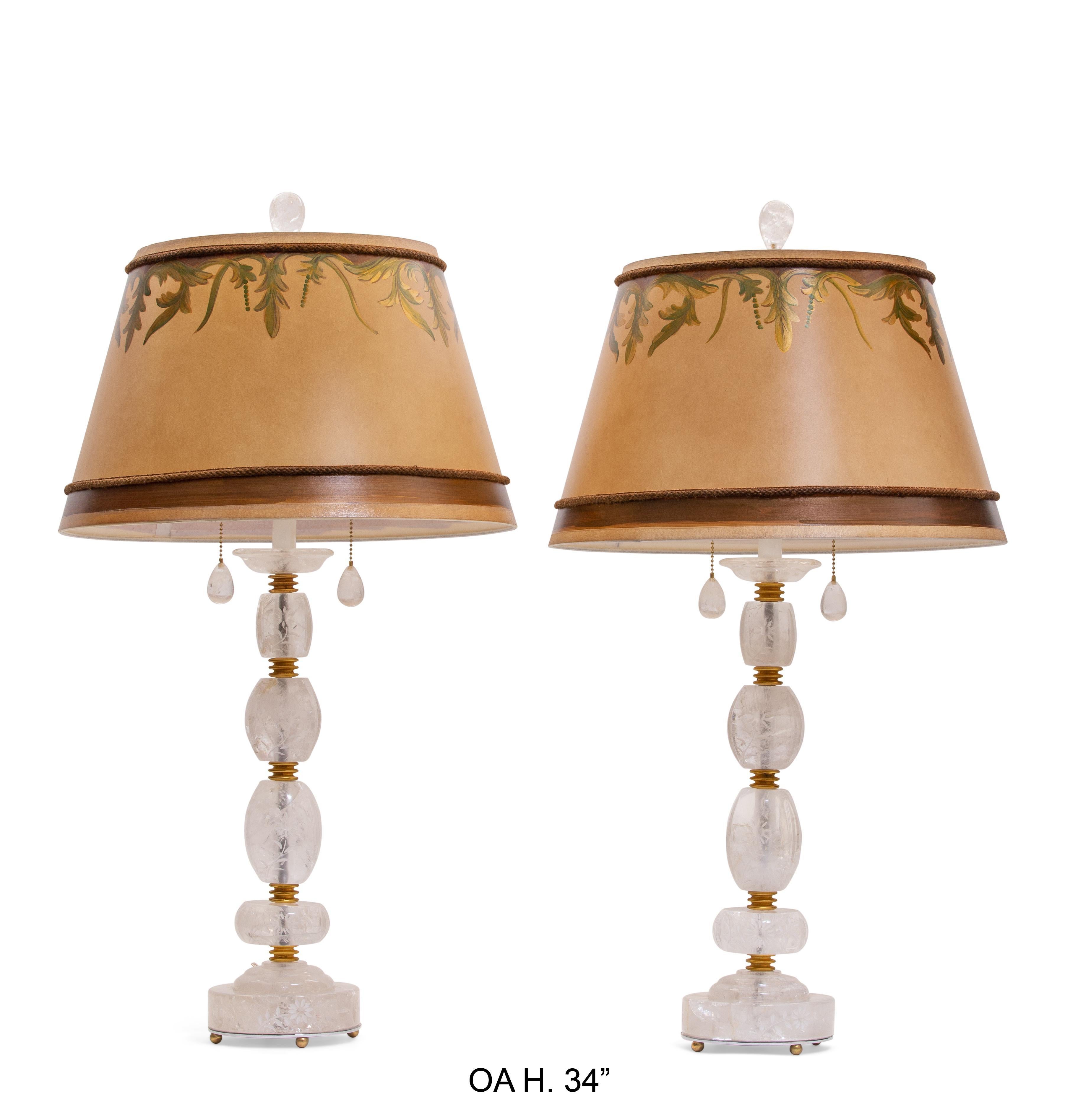 Magnificent and unique pair of engraved rock crystal table lamps.
Rock Crystal is one of the hardest gem stones, the only way to be engraved is by using diamond tools, that is what makes engraving Rock Crystal is almost impossible therefore makes