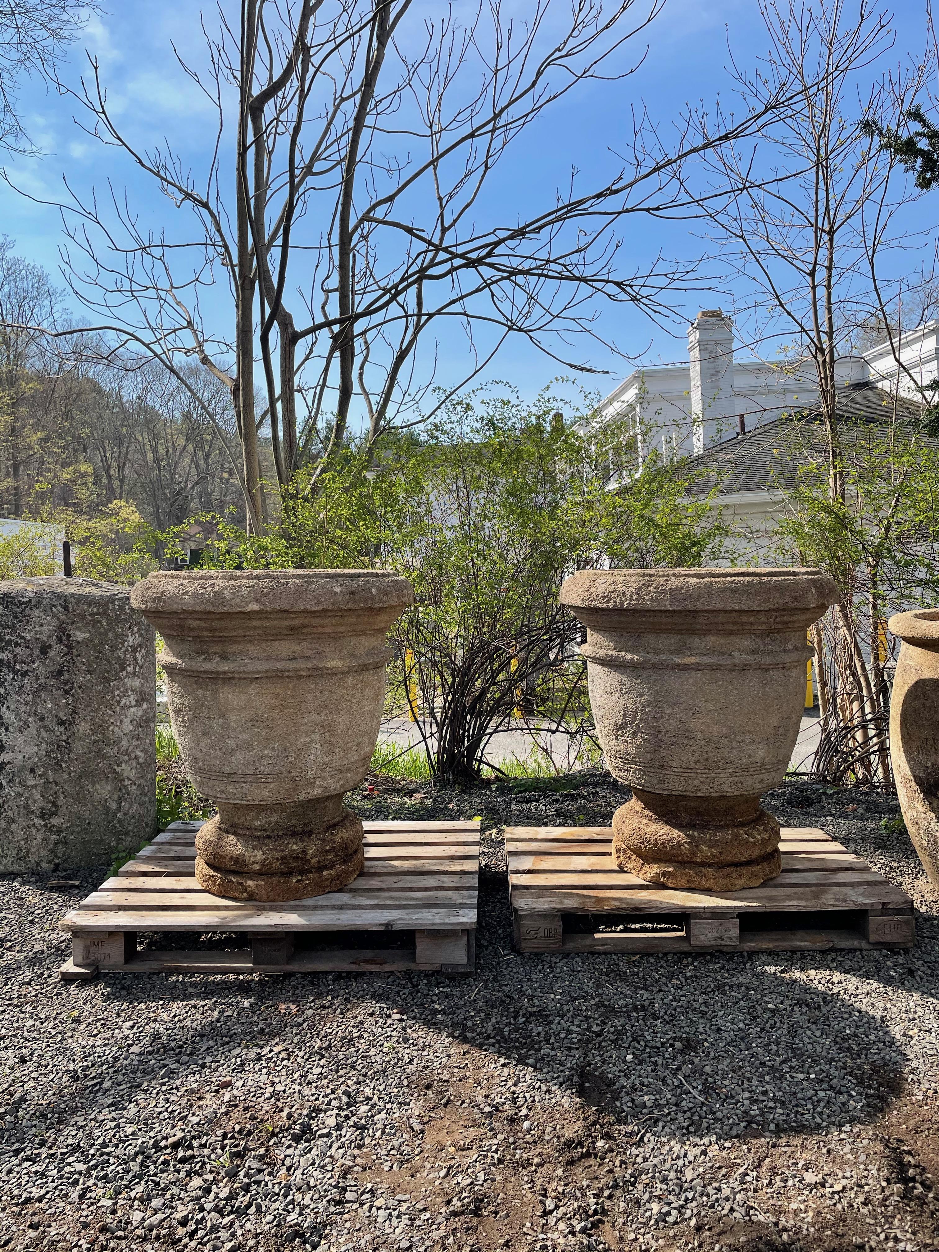 Recently, we were able to source five enormous stone pots/planters carved from Pierre de Rognes, a very hard stone from the area of Aix en Provence and they are stunning. Thick-walled, very rare, and in lovely condition, this pair of grand planters