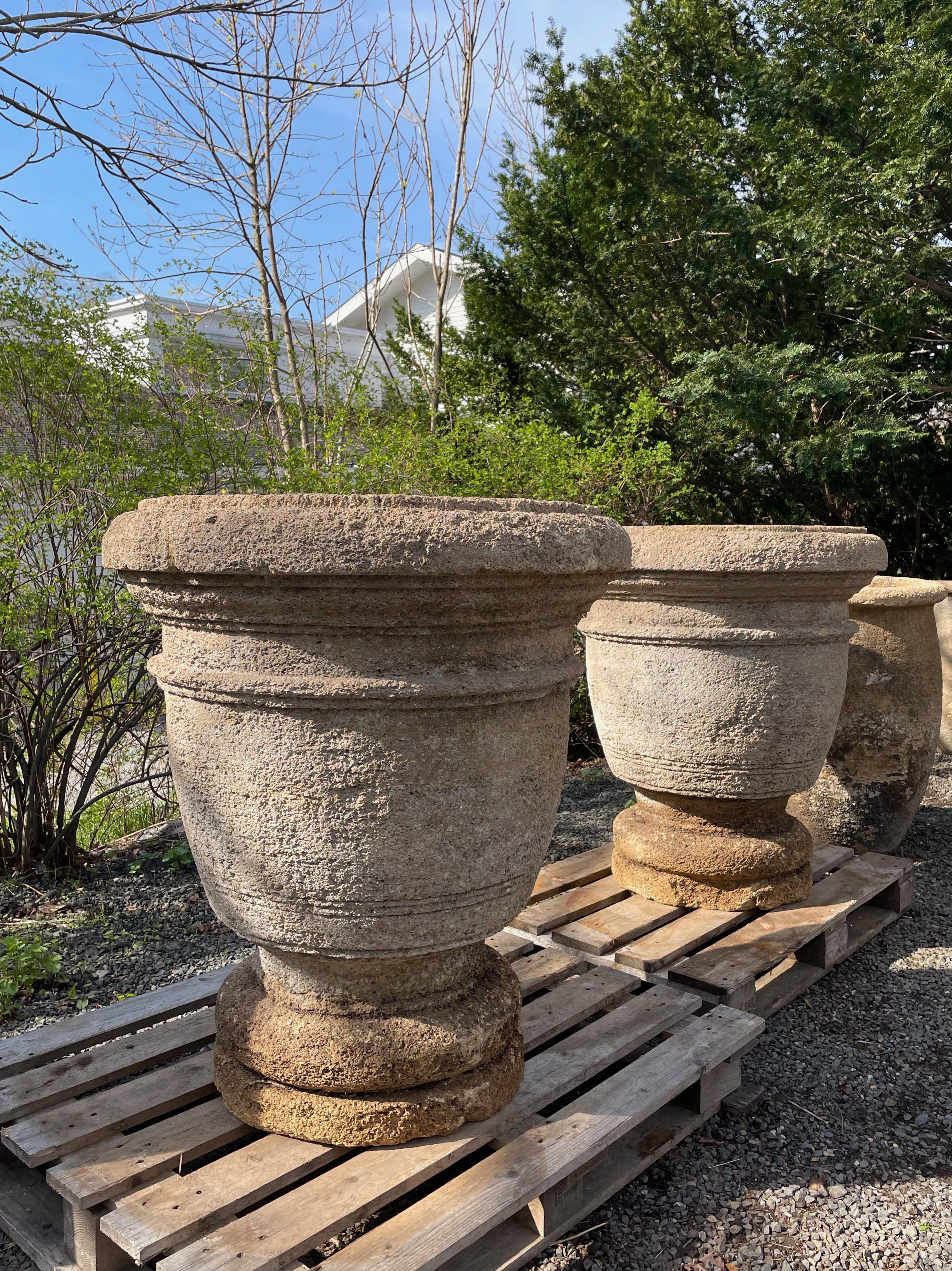 Pair of Enormous French Hand-Carved Stone Planters on Integral Feet In Good Condition In Woodbury, CT