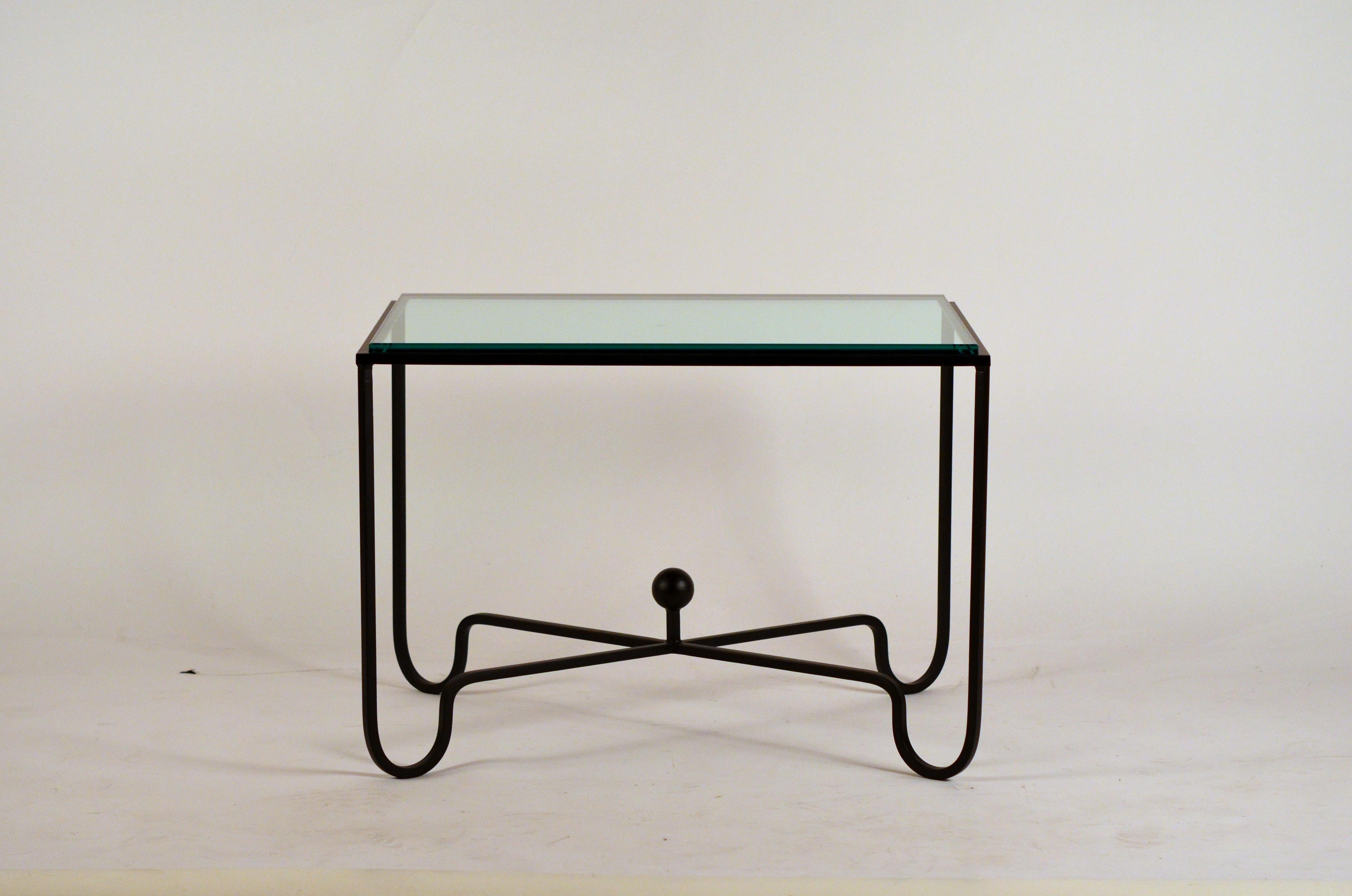 Pair of 'Entretoise' matte black and thick glass end tables by Design Frères. Also great as a two-part coffee table.