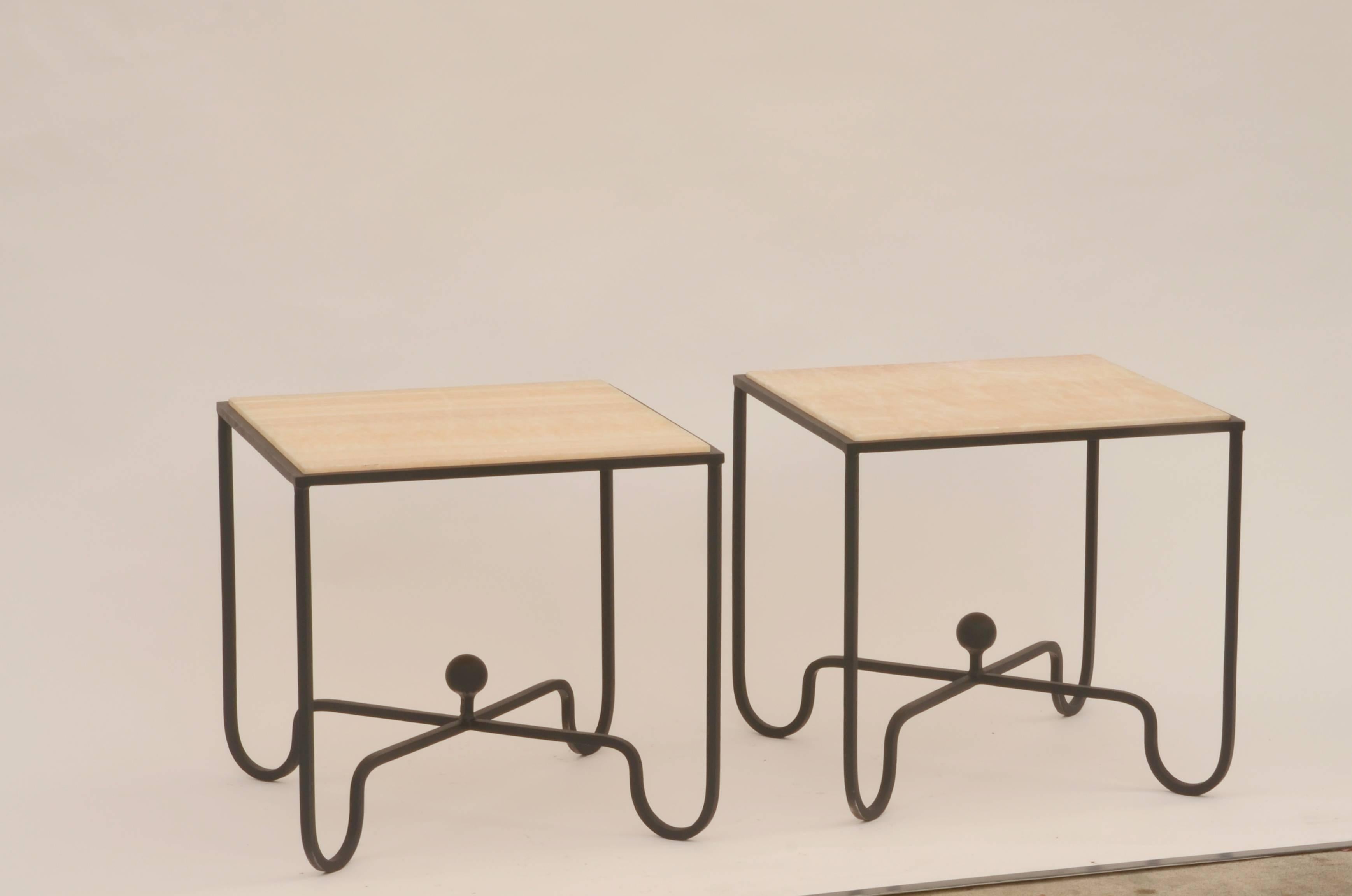 Pair of 'Entretoise' wrought iron and onyx side tables by Design Frères. Great as end tables or as a two-part coffee table. In the style of Mathieu Matégot.


    