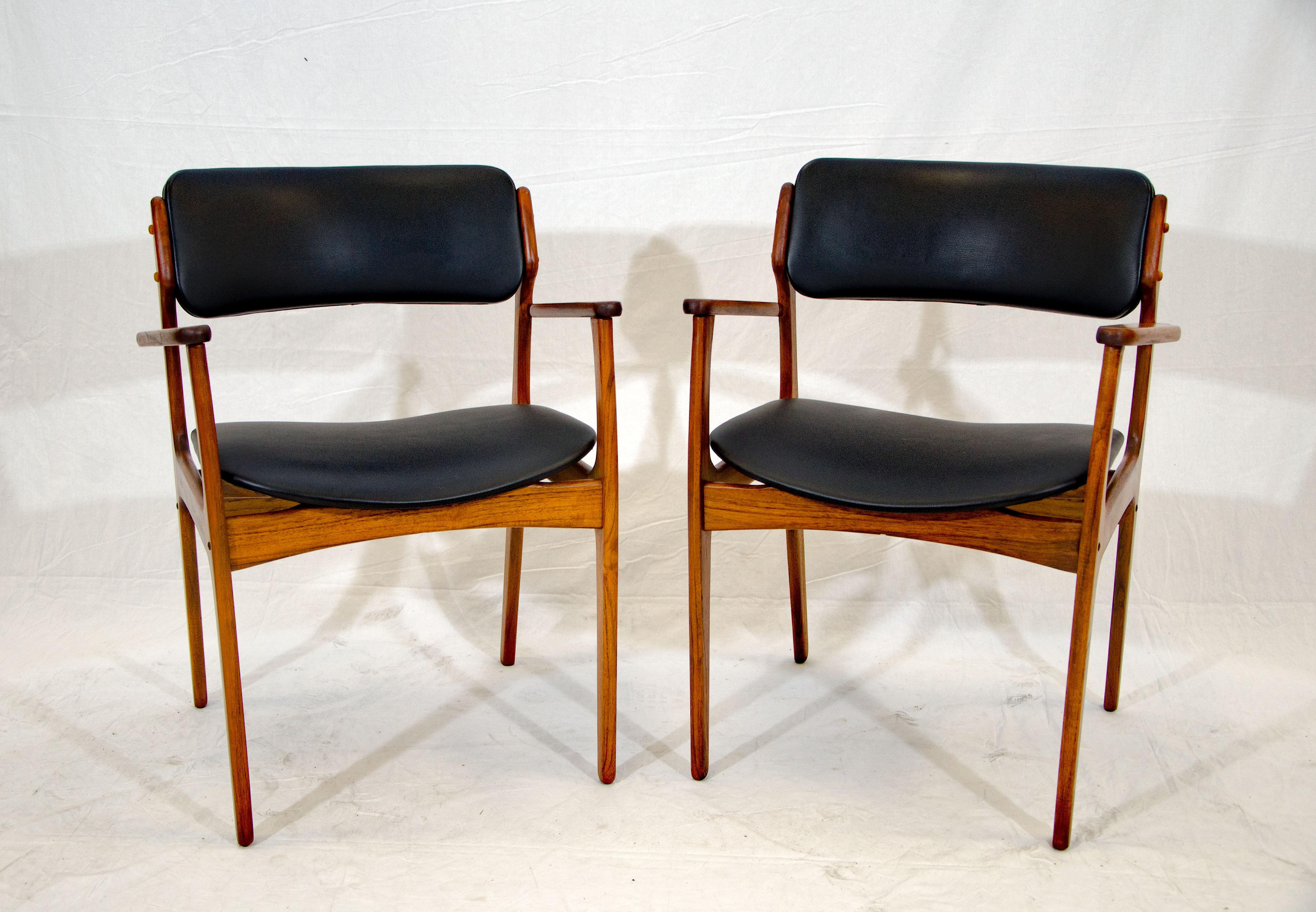 This iconic pair of armchairs designed by Erik Buck (Buch) would be very comfortable home office seating, as well as added guest seating around a dining table. They are very comfortable with padded backs and wide seats.