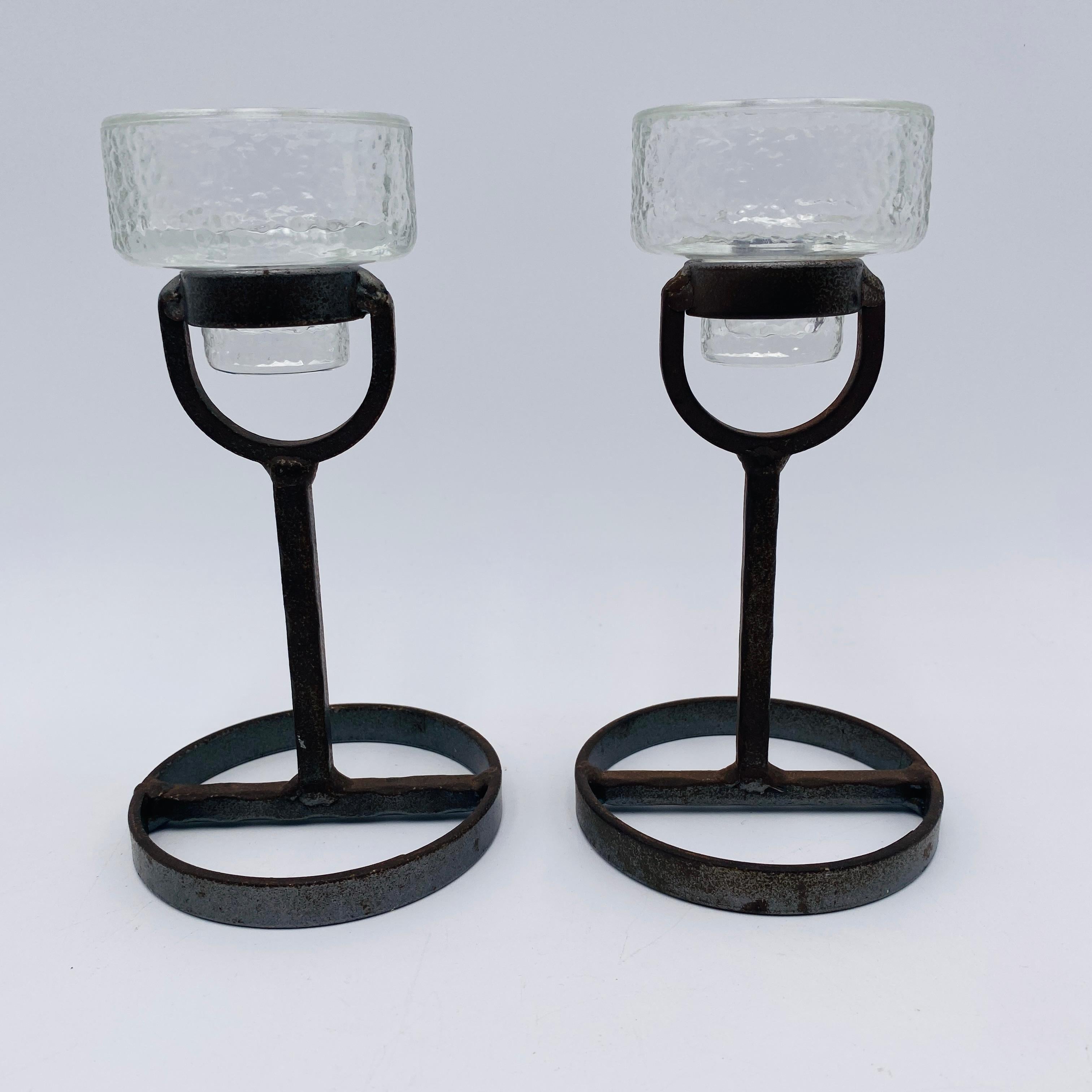 Beautiful pair of candleholders designed by Erik Hoglund for Boda Nova, circa 1950s, an original condition no chips or cracks on the glass, the iron base shows patina due to age.