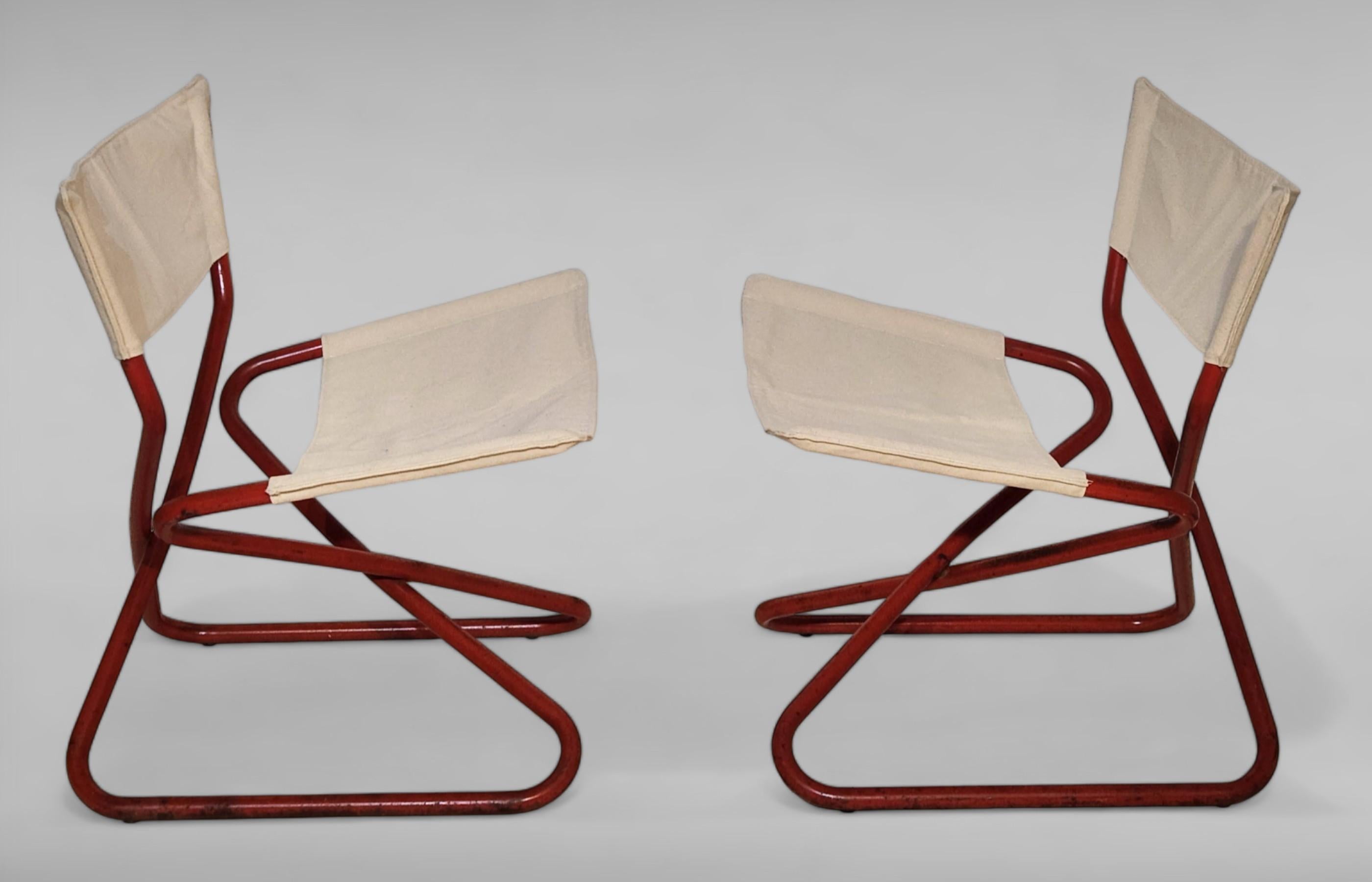 Rare pair of Z easy chairs designed by Erik Magnussen. Produced by Torben Ørskov in Denmark c. 1968 folding chairs.
Original paint and canvas slip on upholsteries. 
Price is for the pair.
Shipping the pair to Europe via FedEx Economy Feight air 10