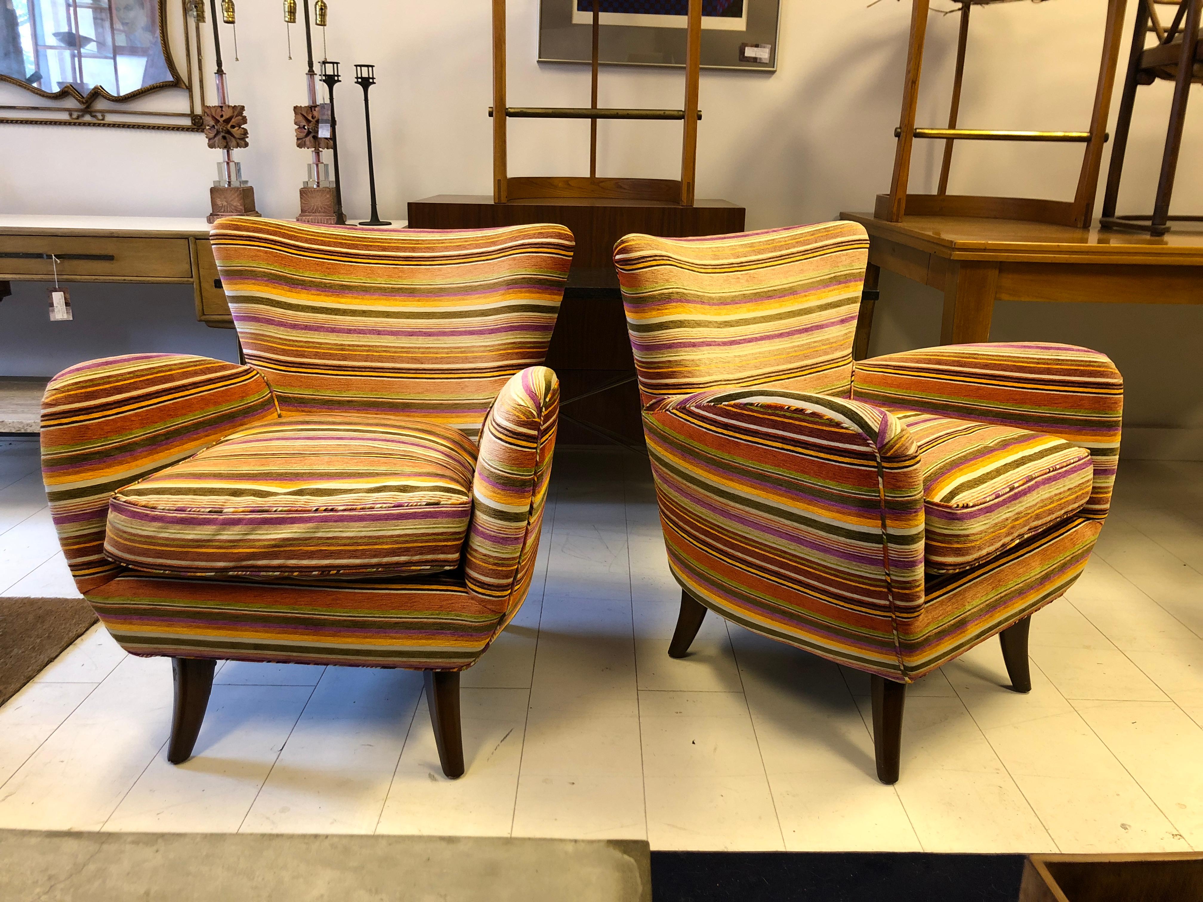 Classic Schwadron lounge chairs with carved walnut legs in a vintage striped cotton velvet.