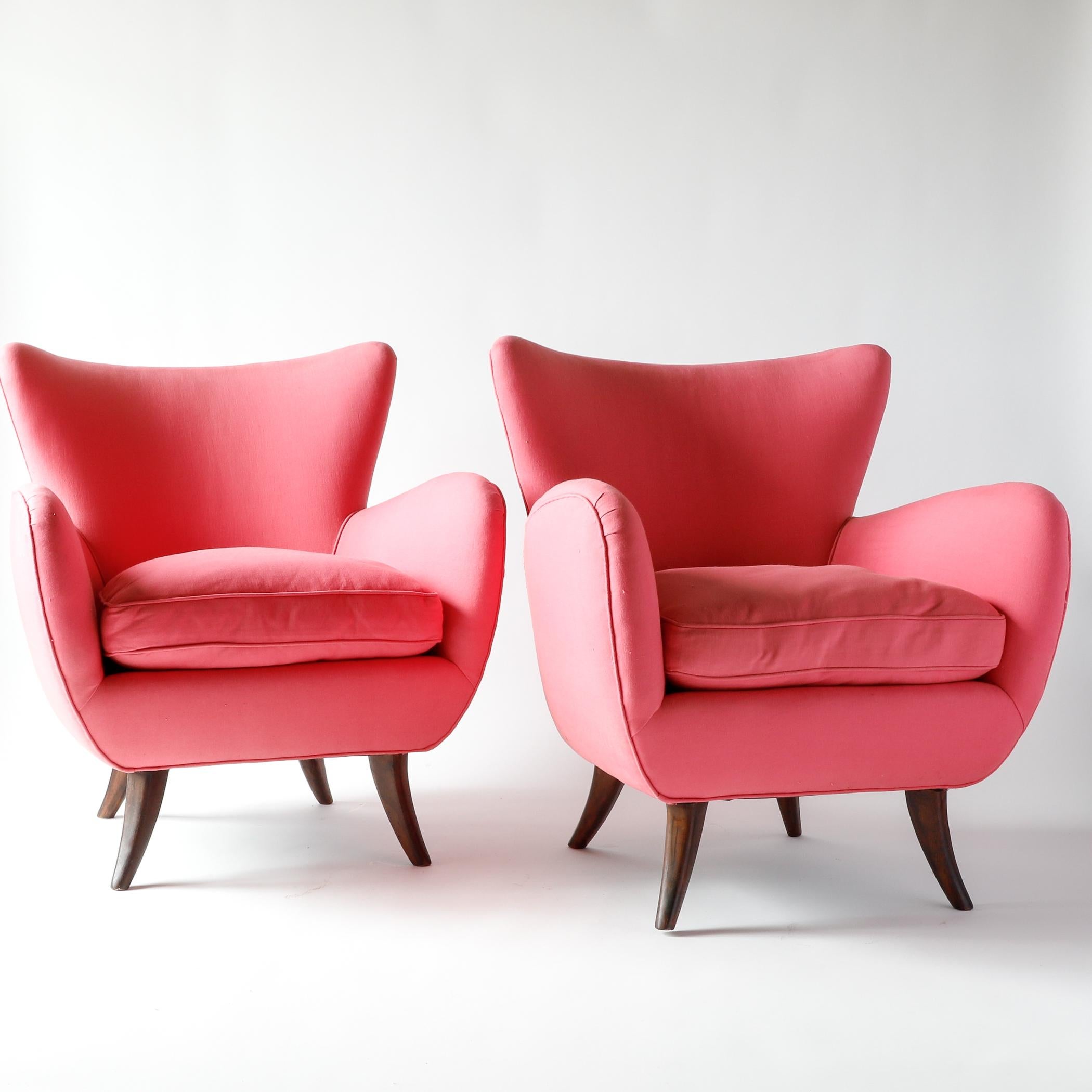 Pair of upholstered lounge chairs by Austrian-American designer Ernst Schwadron. Having emigrated to the United States in the late 1930s, Schwadron became the chief designer for New York retailer Rena Rosenthal and an early designer for Knoll in the