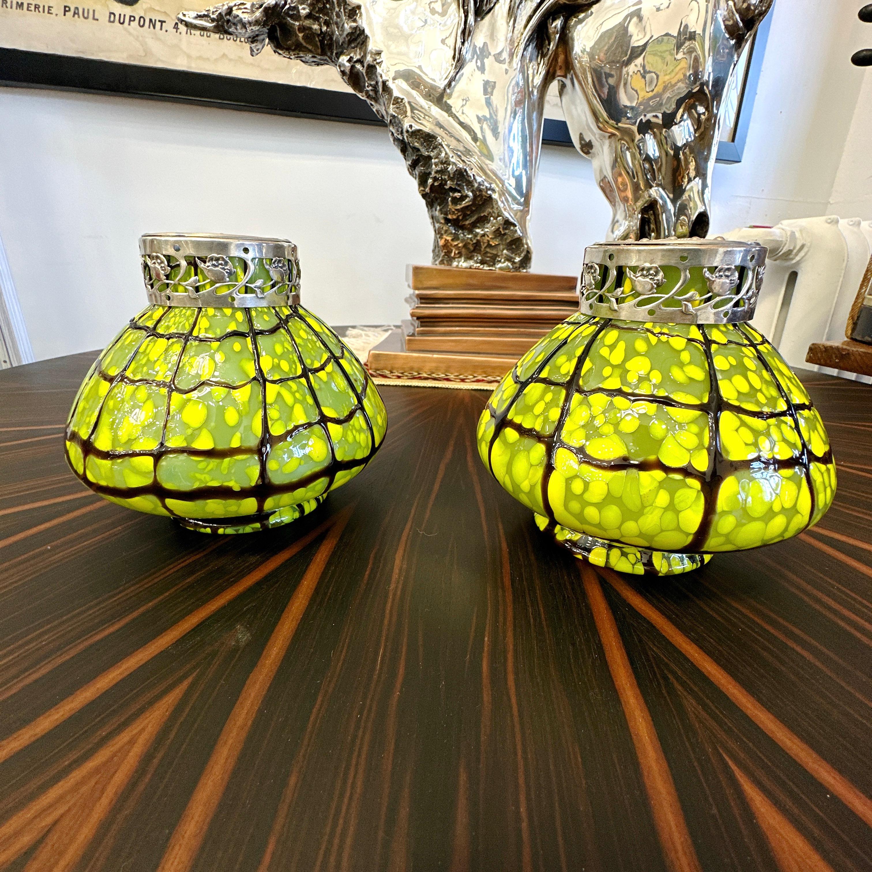 Here is a beautiful pair of Pair of Ernst Steinwald and Co. Kralik Bohemian VZ 47 Green and Yellow Flower Frog Vases. 

Made in Czechoslovakia (stamped on inside of metal frog), these striking frog style vases are in overall very good condition with