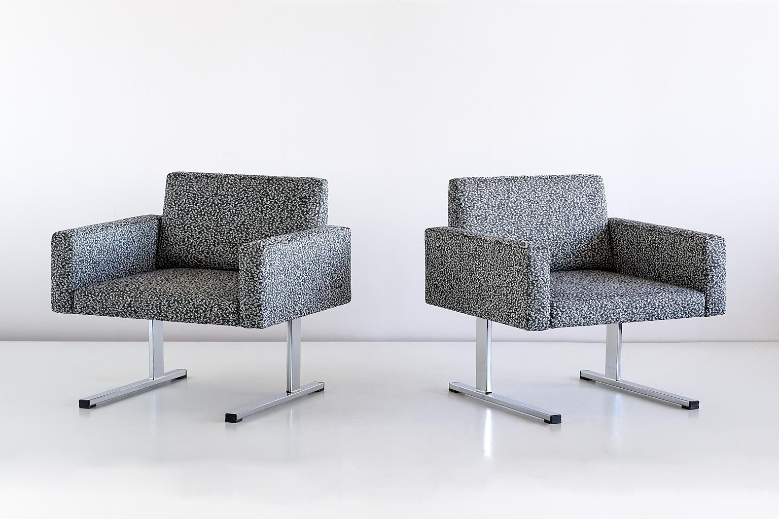 This exceptionally rare pair of lounge chairs was designed by Esko Pajamies and produced by the Finnish company Merva in the 1960s. The rectangular shape of the seat, armrests and backrest give the chair a geometric and modernist appearance. The