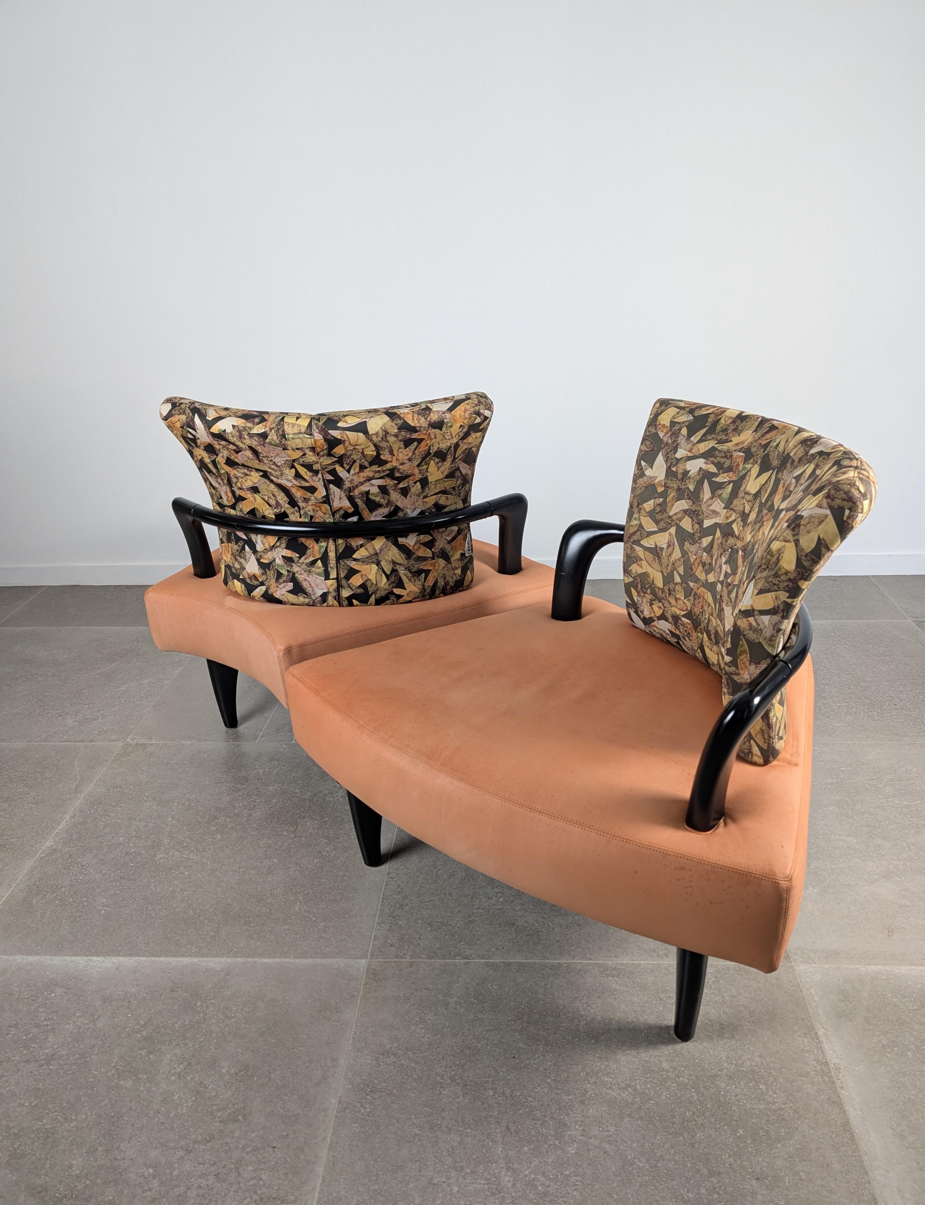 Rarely seen on the market, this Esprit modular sofa was designed by Brunati and Zerbaro for Brunati in the 1980s. Its sculptural structure, with black lacquered wooden legs and curved armrests, is paired with a striking upholstery that combines warm