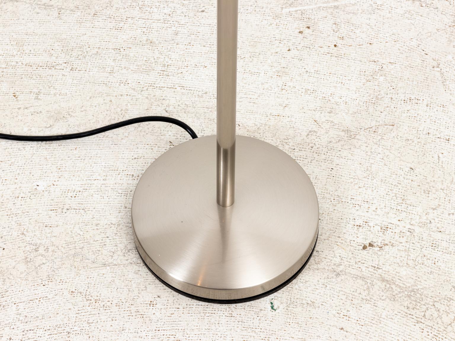 Estiluz brushed nickel floor lamps, circa 21st century. Please note of wear consistent with age.