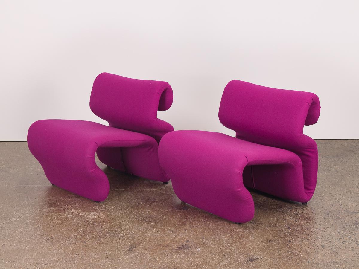 Pair of Space Age Etcetera Chairs by Swedish designer Jan Ekselius. Truly amazing, dynamic sculpted form. Newly upholstered in a bold magenta Knoll hopsack, and fresh new foam inside. Cushions are buoyant, and are supremely comfortable to sit in.