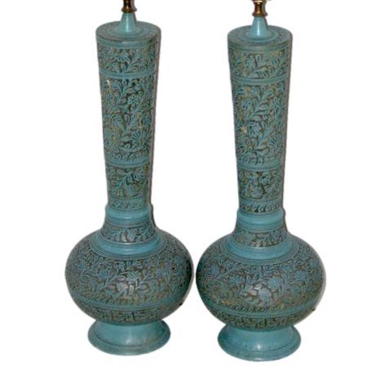 Pair of circa 1950's etched Turkish brass lamps with original turquoise painted finish.

Measurements:
Height of body: 22