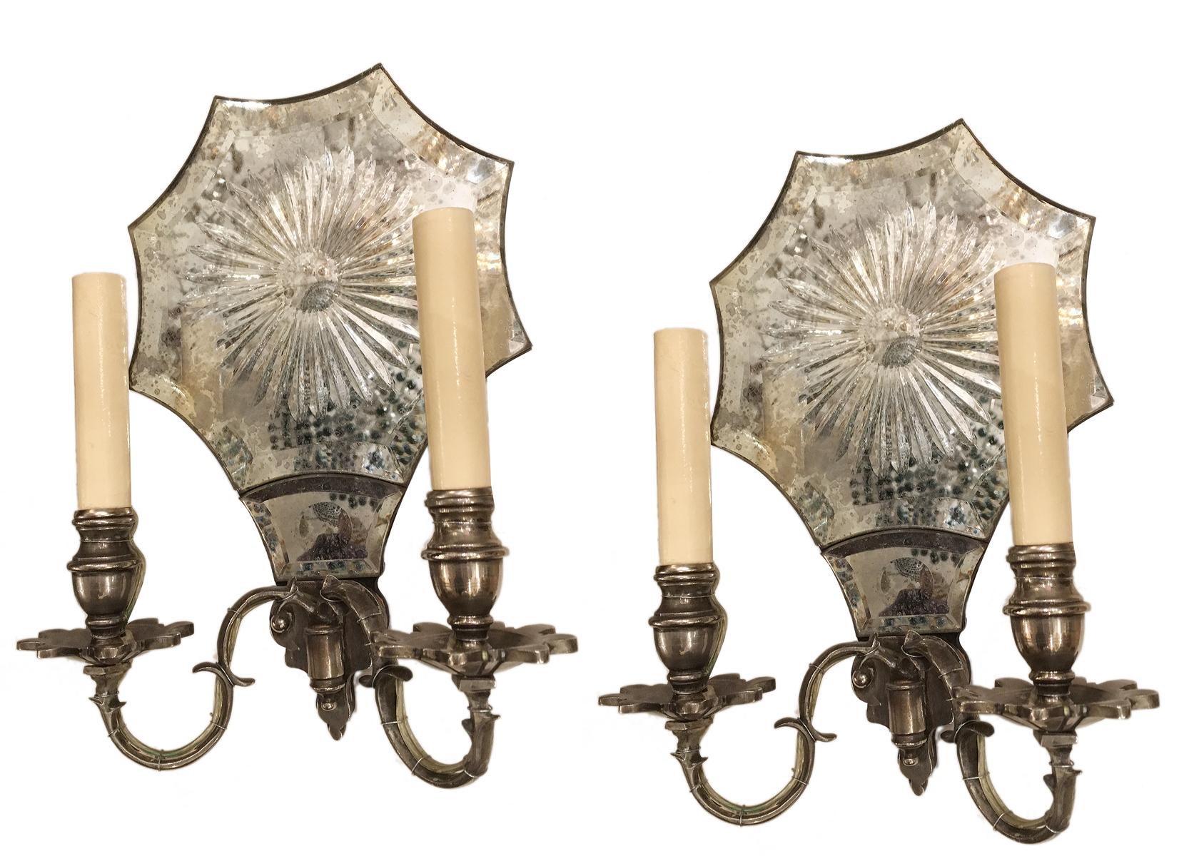 Pair of circa 1950s American etched mirror sconces with silver plated body. 

Measurements:
Height 12