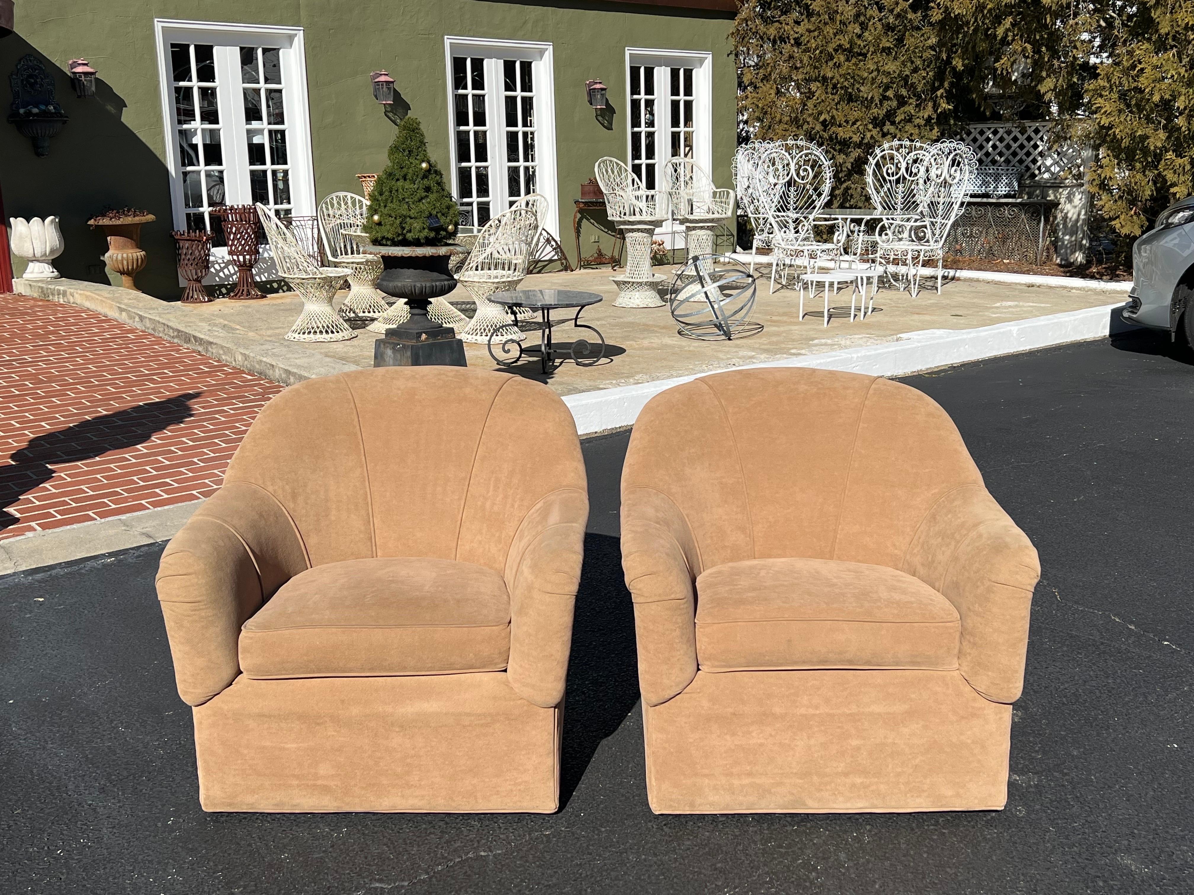 Pair of Ethan Allen Swivel chairs. Classic, normal sized, cube chairs with swivel base. 
High quality all around. Super comfortabel for any body size. Very durable chenilee type fabric in a camel color. Ready to use as is or recover to your