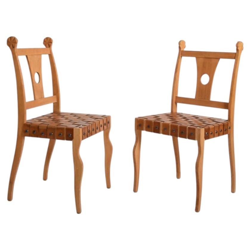 Pair of etruscan oak and leather chairs, 1970s For Sale