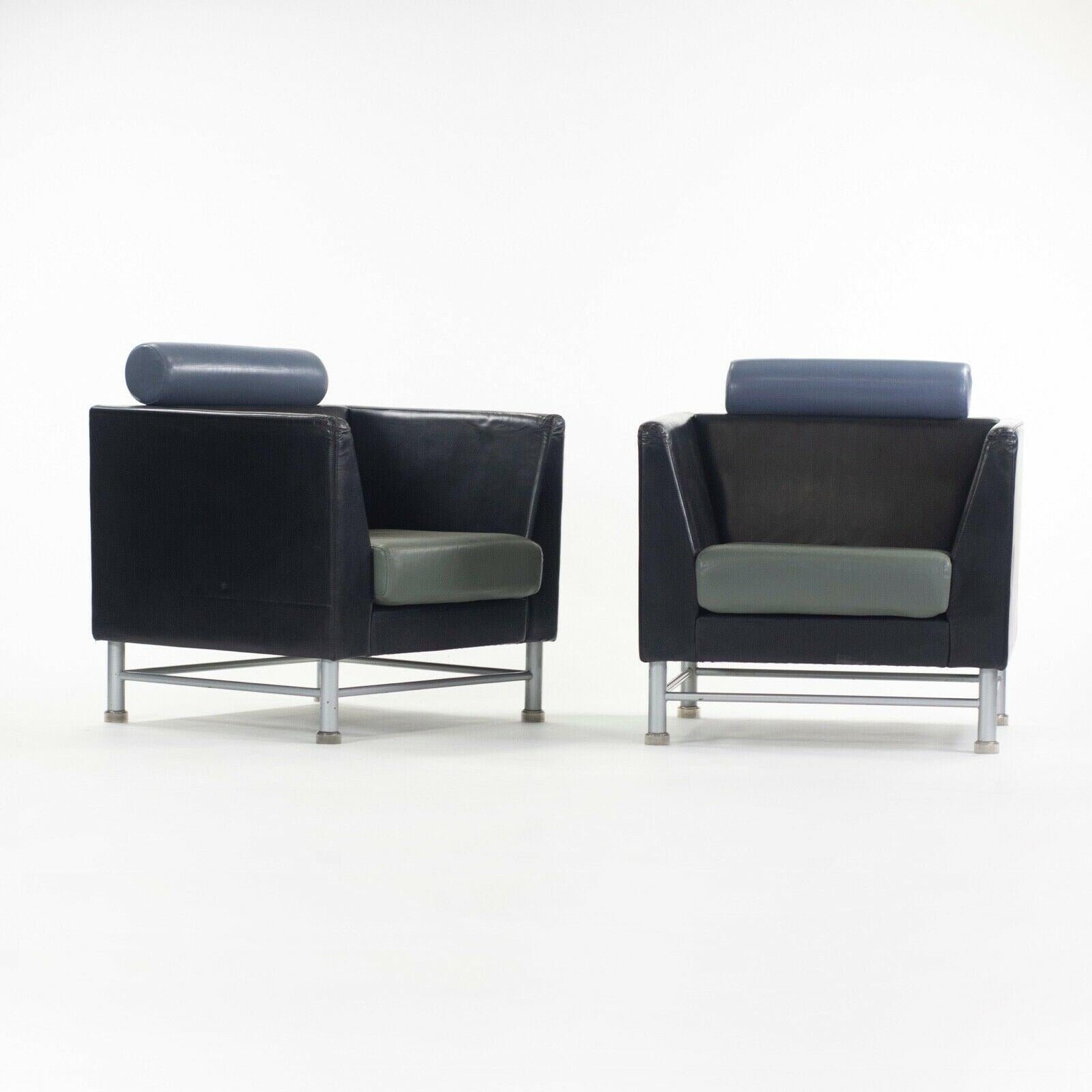 Listed for sale is a pair of gorgeous and original Ettore Sottsass Eastside lounge chairs, produced by Knoll International. These two lounge chairs came from the American Airlines executive lounge at Chicago O'Hare Airport. They are in lovely