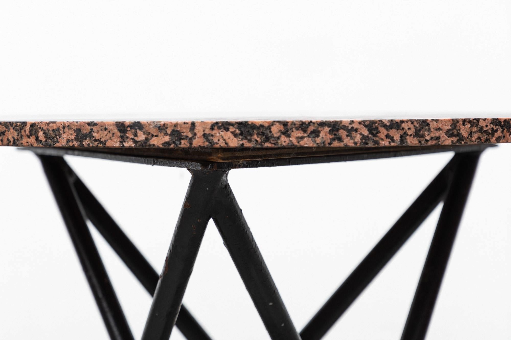 Pair of Ettore Sottsass Style Red Granite Side Tables with Architectural Bases In Good Condition For Sale In Los Angeles, CA