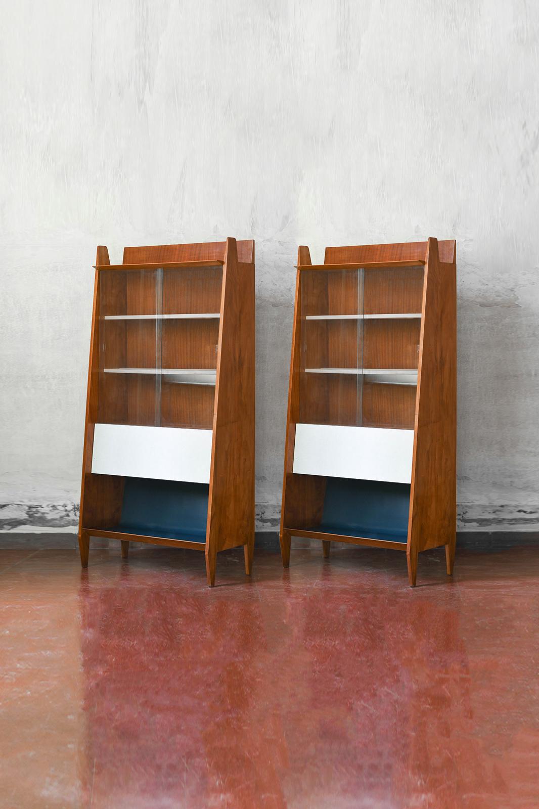 Pair of sideboards with risers. Production Sorgente dei Mobili 1950s
Materials: Wood, linoleum, formica, ground glass.
Designer: Eugenia Alberti Reggio
Production: Sorgente dei Mobili from the 1950s. 
Special commission for house M. 
Como, then