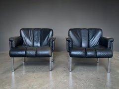 Pareja de tumbonas Eurochair de Hans Eichenberger, cuero y acero, 1970