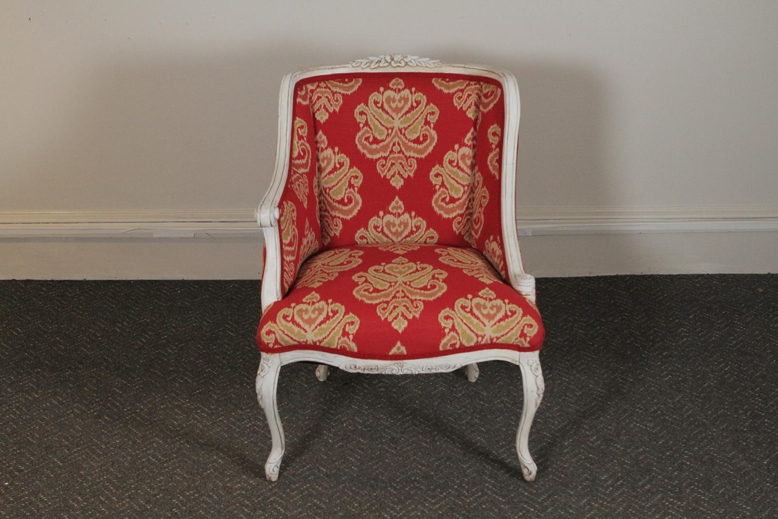 Pair of European asymmetrical style accent chairs with new red and white Ikat fabric and whitewashed wood frames
 Dimensions: 24” W x 25” D x 31.5