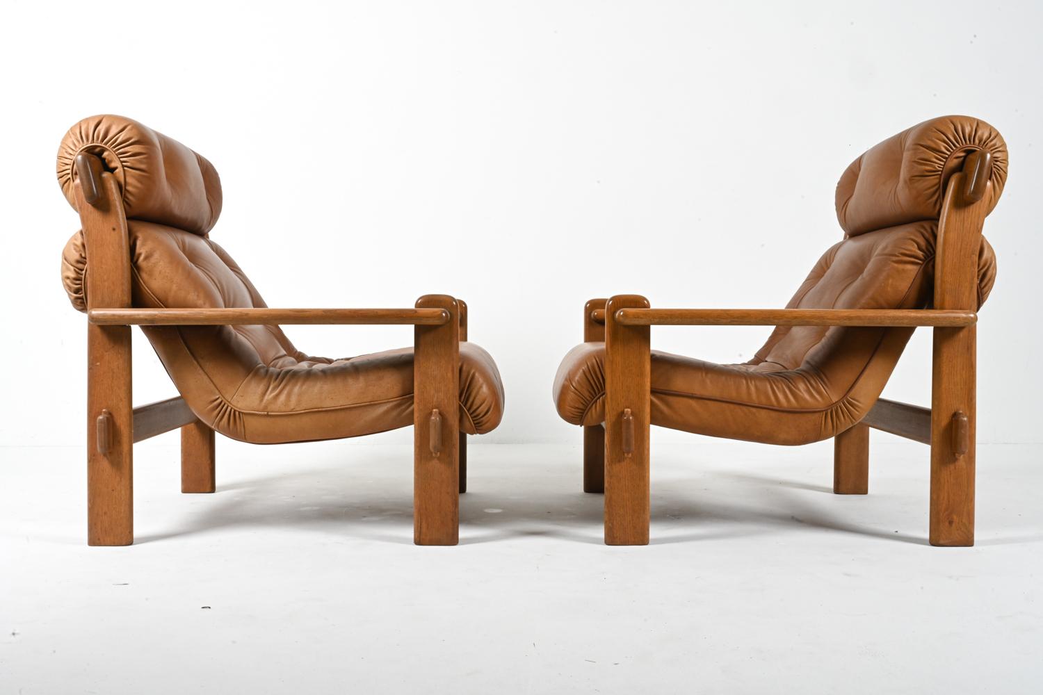 Paire de fauteuils brutalistes européens en chêne et cuir, vers 1970 en vente 10