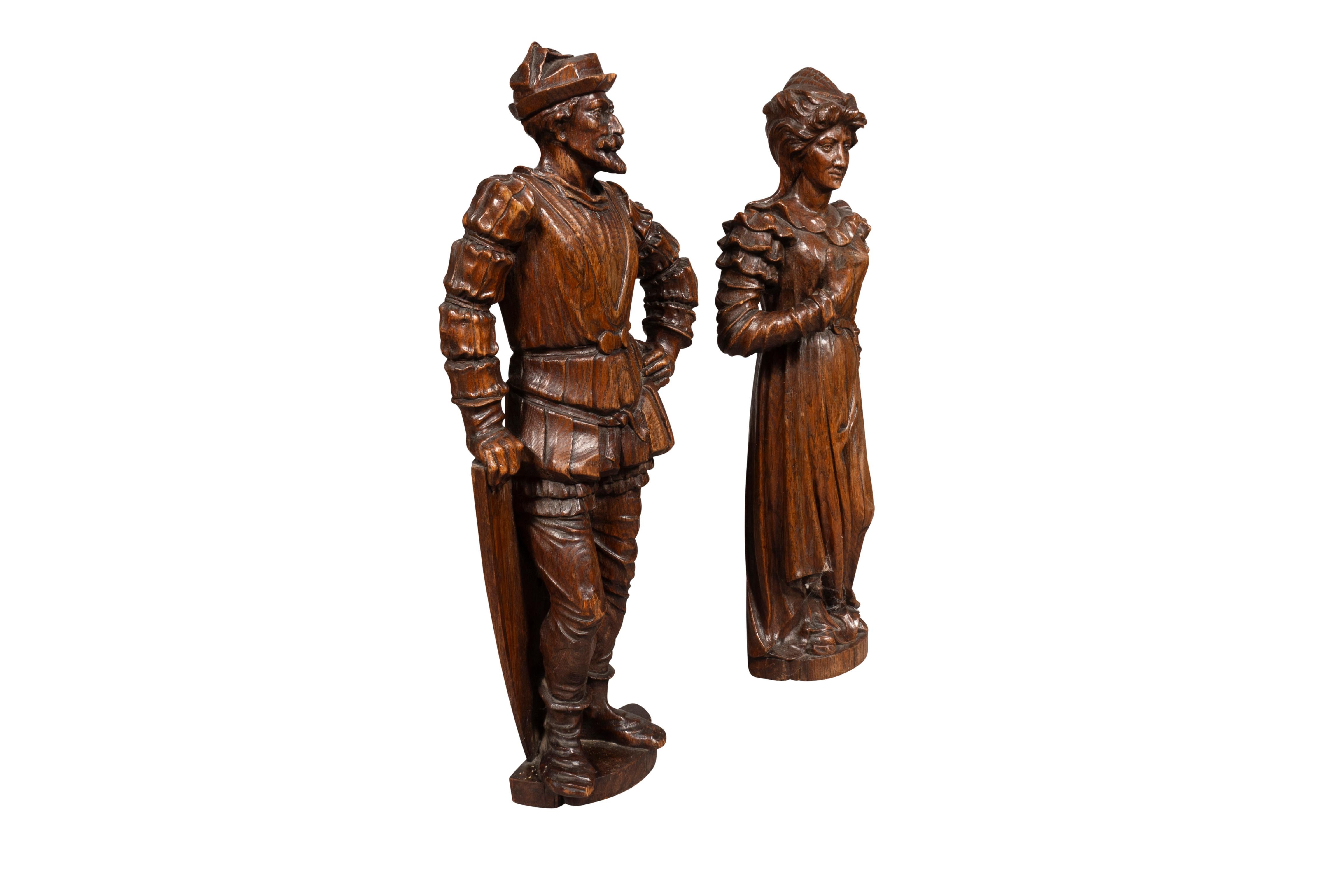 Featuring a man and woman in 19th century dress. Well carved .