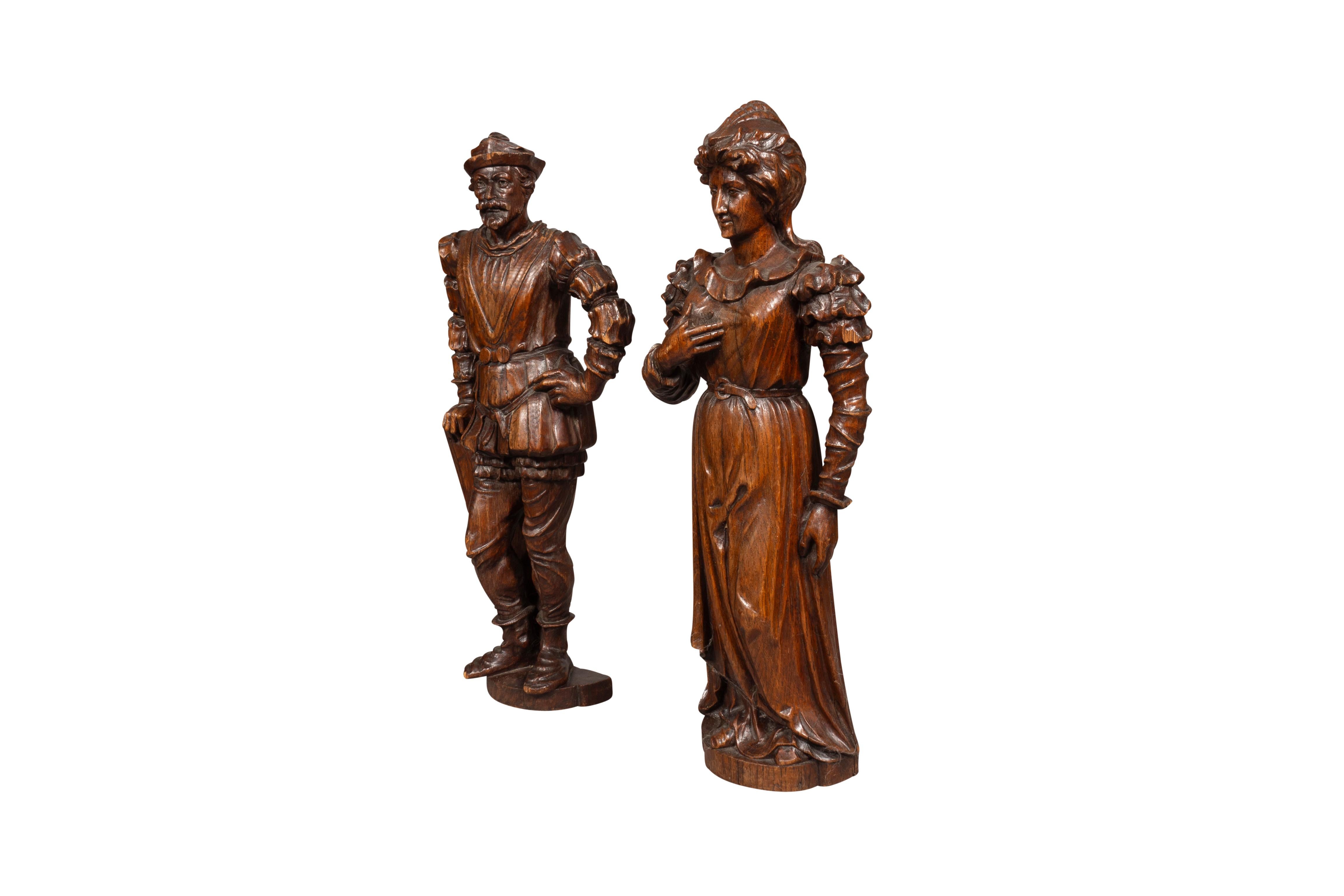 Oak Pair Of European Carved Figures Of A Man And Woman For Sale