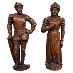 Paar europäische geschnitzte Figuren eines Mannes und einer Frau