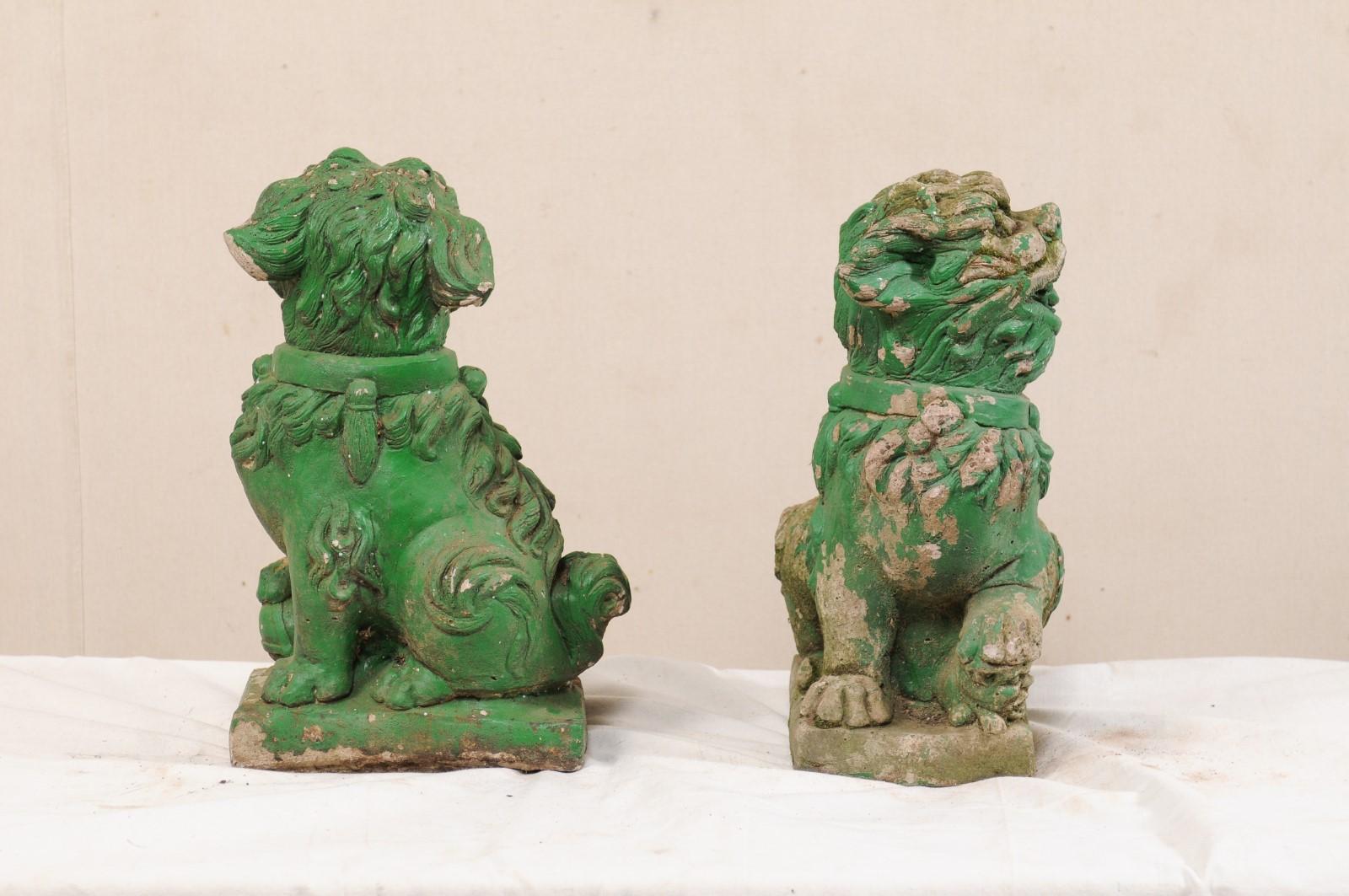 Cast Stone Pair of European Foo Dog Statues with their Original Green Paint For Sale
