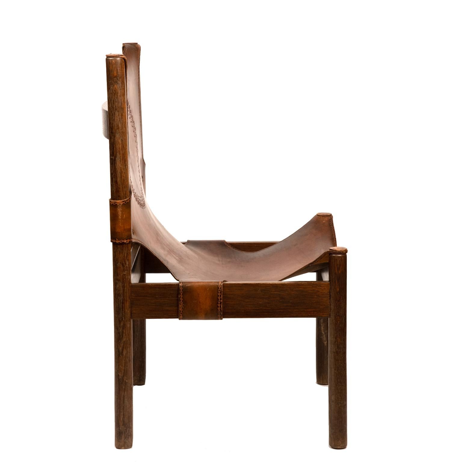 Patinated Pair of European Leather and Wood Safari Style Chairs