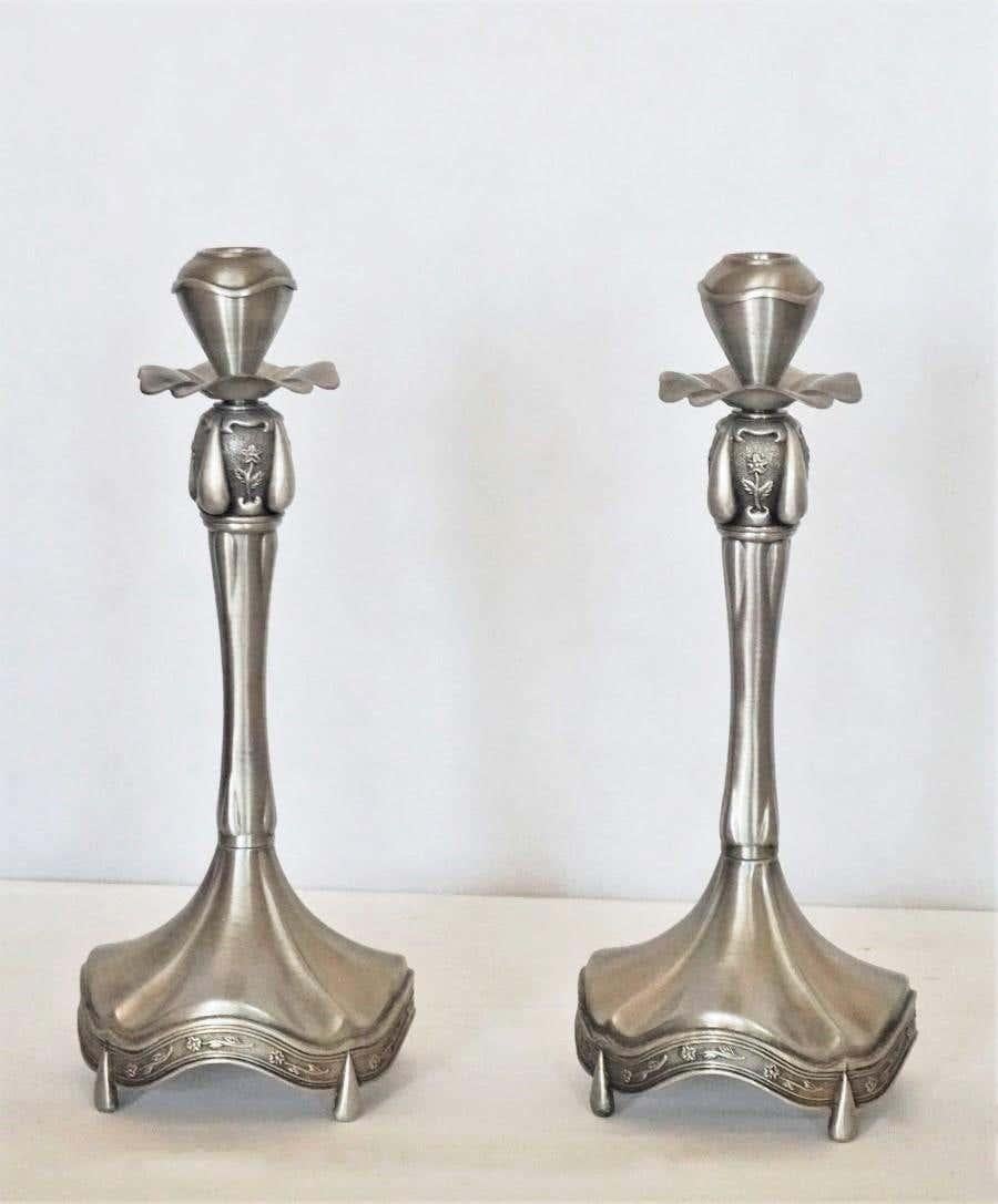 Pair of European vintage pewter candleholders with elaborate base.
Measures:
Height 13 in (33 cm)
Diameter: 6 in (15 cm).