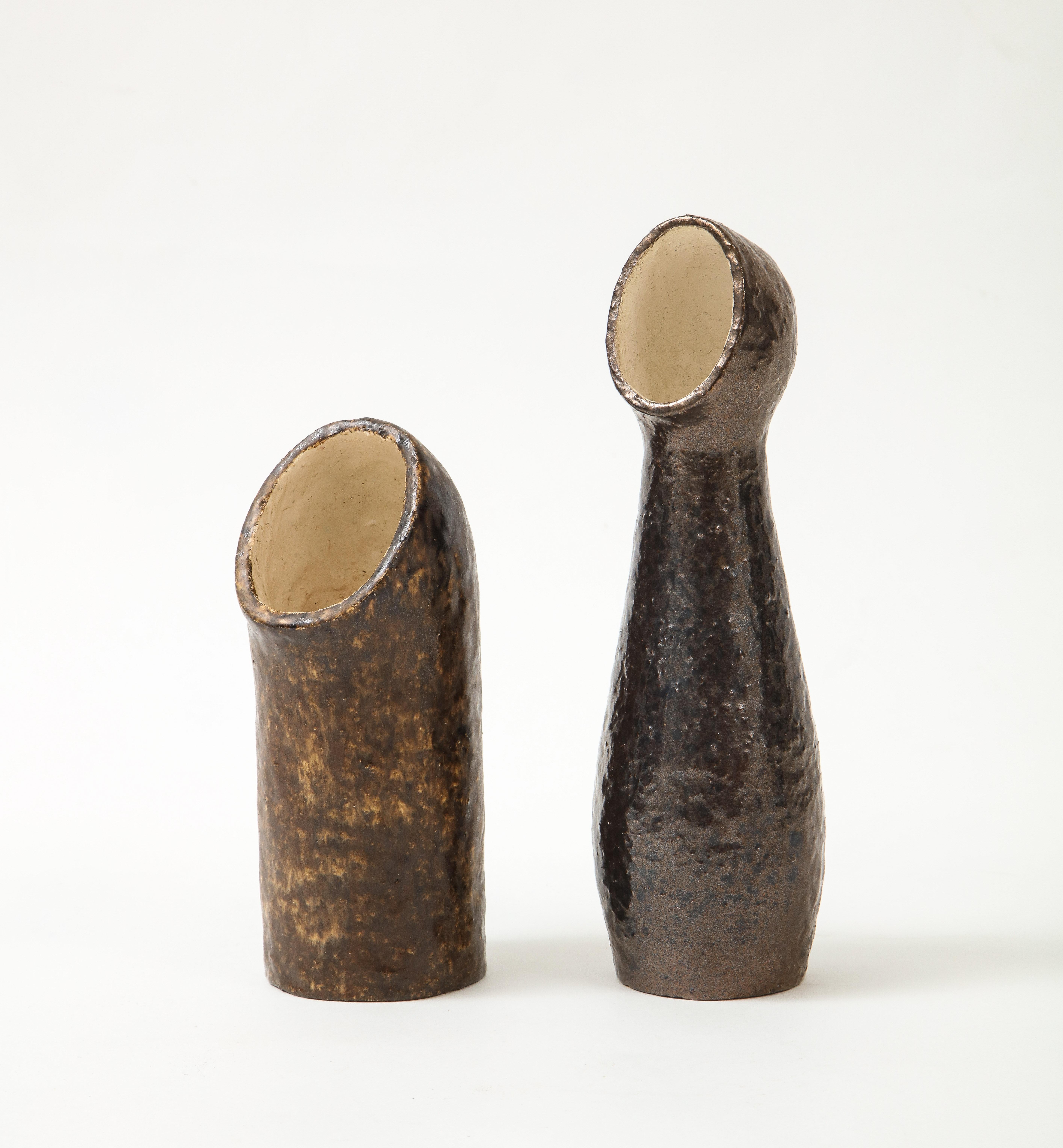Pair of sculptural ceramic vases in the style of borderie, 1960's, the Netherlands, signed: índecipherable'
Measures: Height 7.5, 10 diameter 2.5 in.