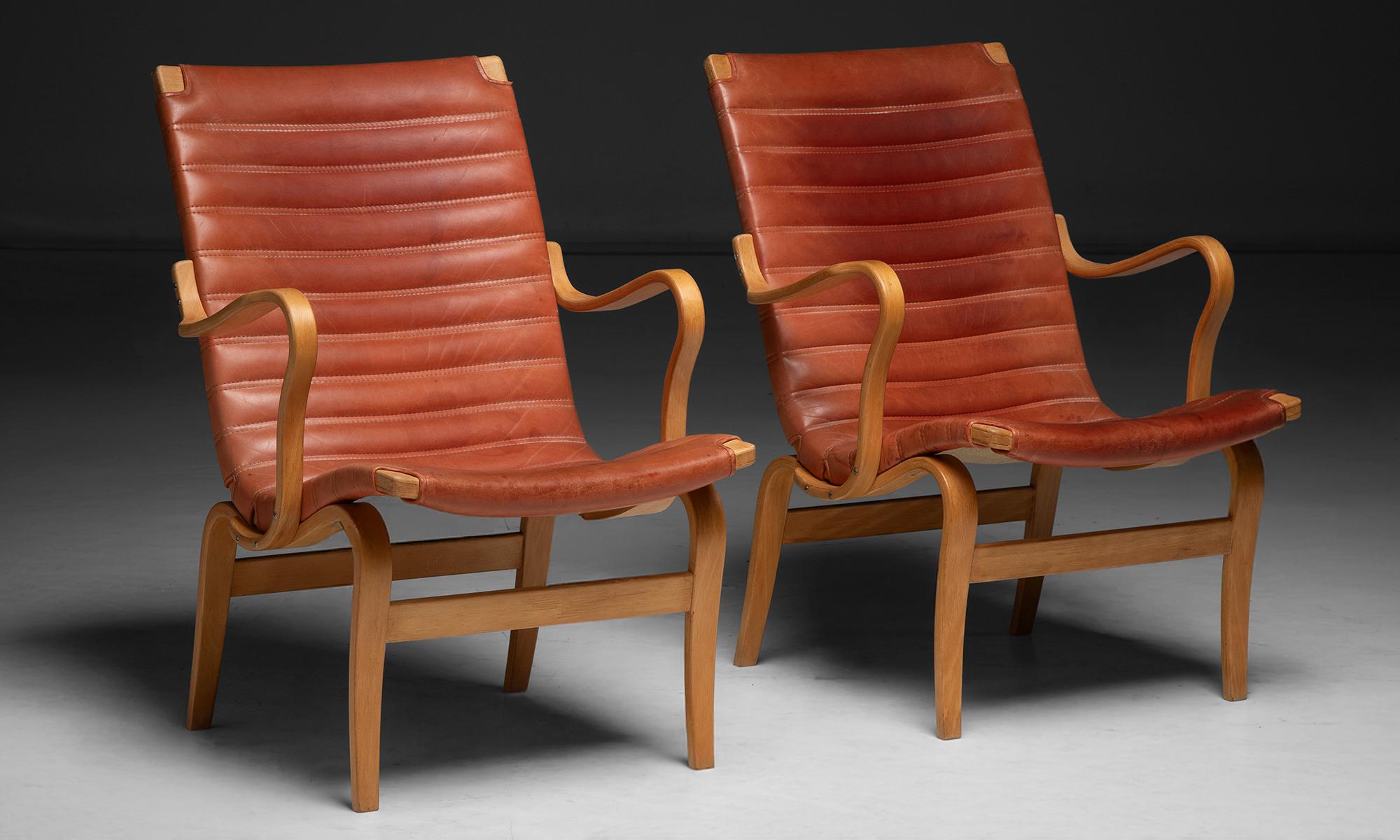 Sweden, 1970
Original padded leather seat on beech frame.
23.5”w x 27”d x 33”h x 15.25”seat
Ref. MOD1147
$ 8,200 pair
