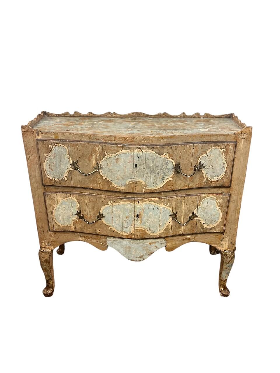 Pair of Exceptional 18th Century Italian Painted Commodes with serpentine fronts with 2 large drawers over a shaped apron on cabriolet legs. Beautiful patina. Very solid pair.