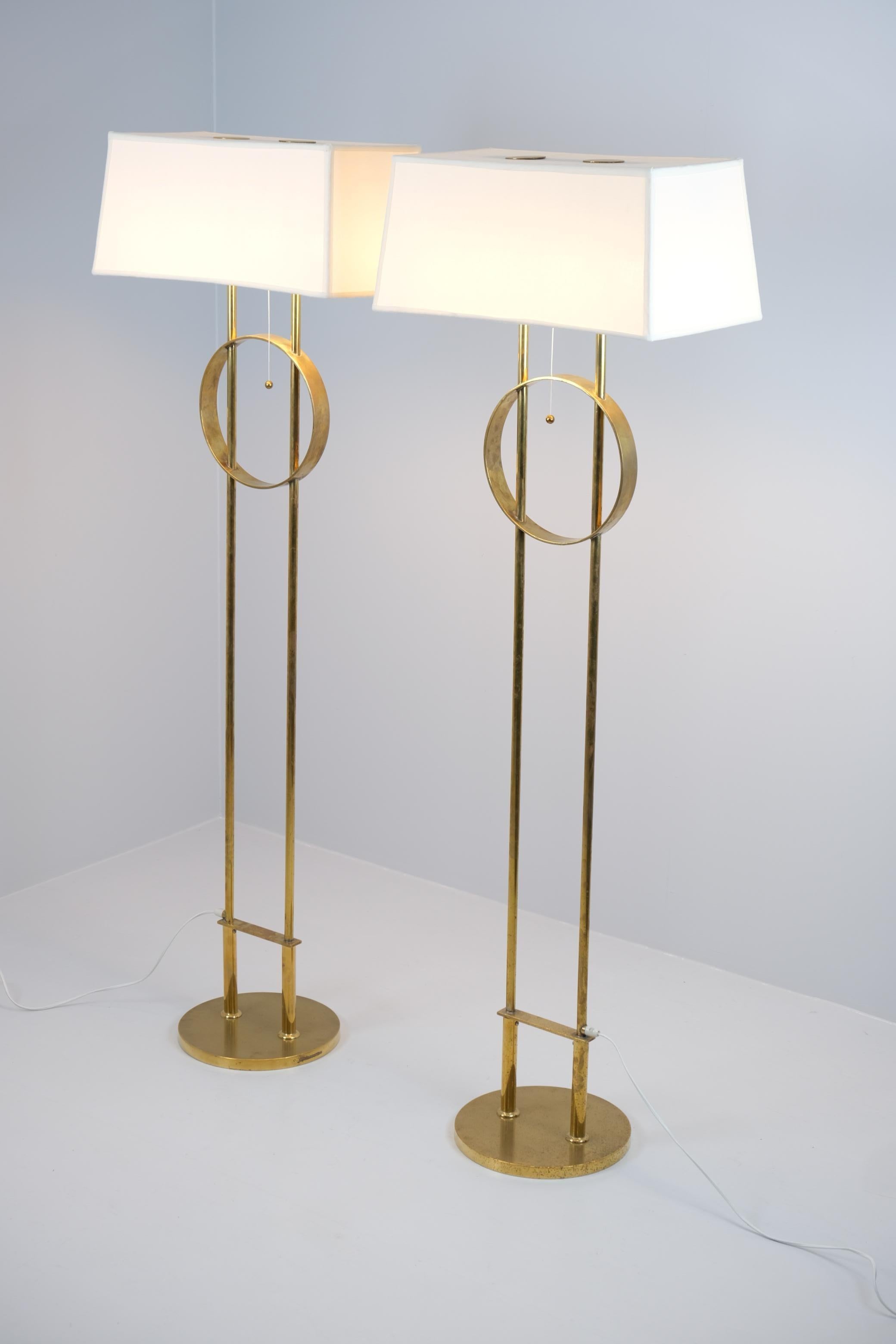 A Grand pair of Paavo Tynell floor lamps commissioned for the HOK Suurravintola 