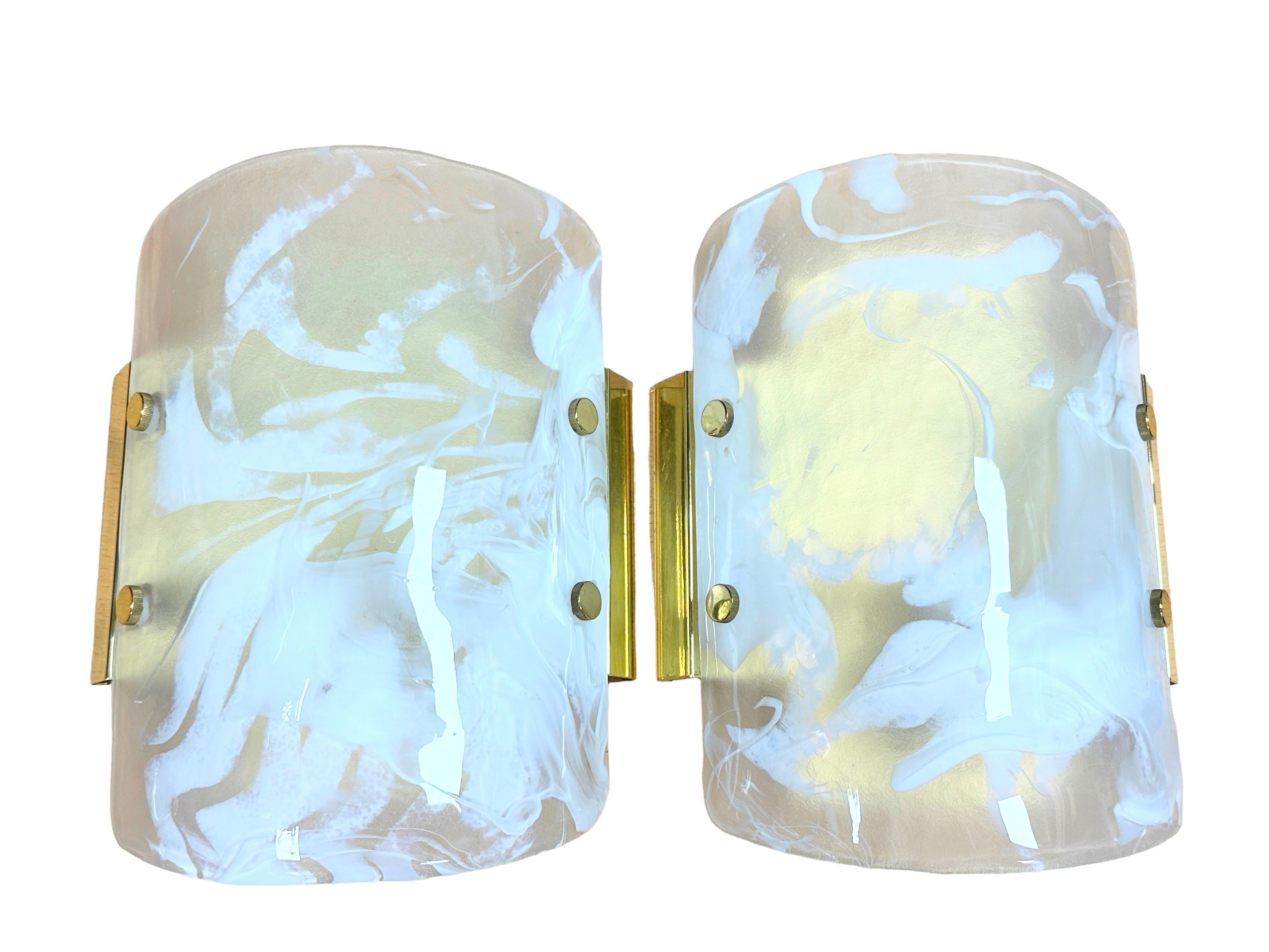 A pair of wall lights by manufacturer Hillebrand Leuchten, Germany. Original modernist German wall light from the 1970s in high quality glass in an marble shape glass. This extremely rare pair of wall lights was manufactured by Hillebrand Leuchten